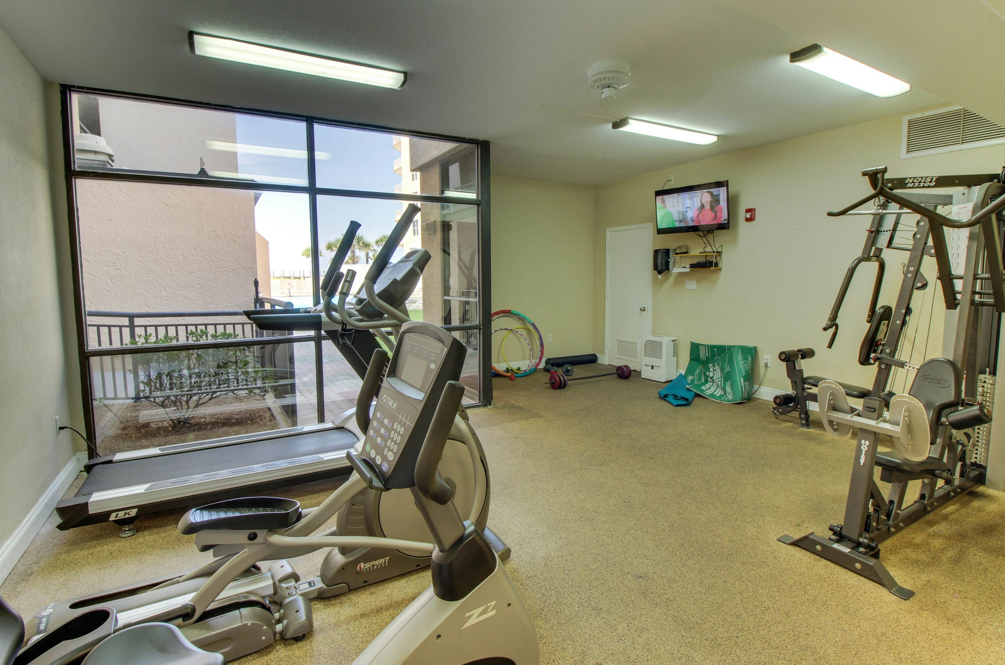 Cardio and strength equipment in the fitness center at Navarre Towers 