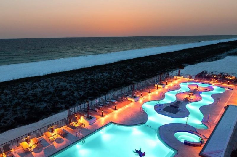 Still enjoy the lovely beachside pool and lazy river after the sun goes down