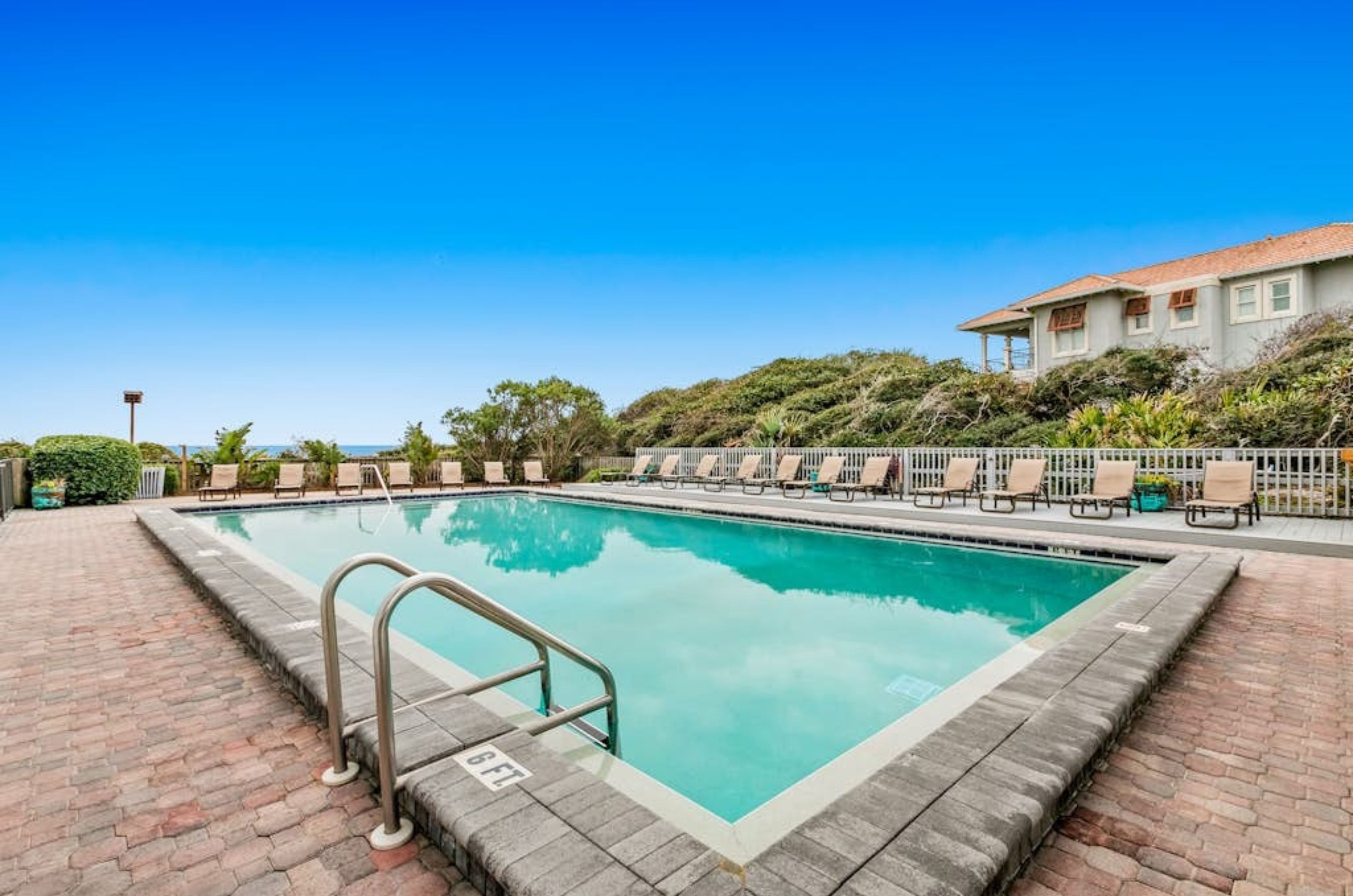 The outdoor swimming pool at One Seagrove Place in Seagrove Beach Florida 