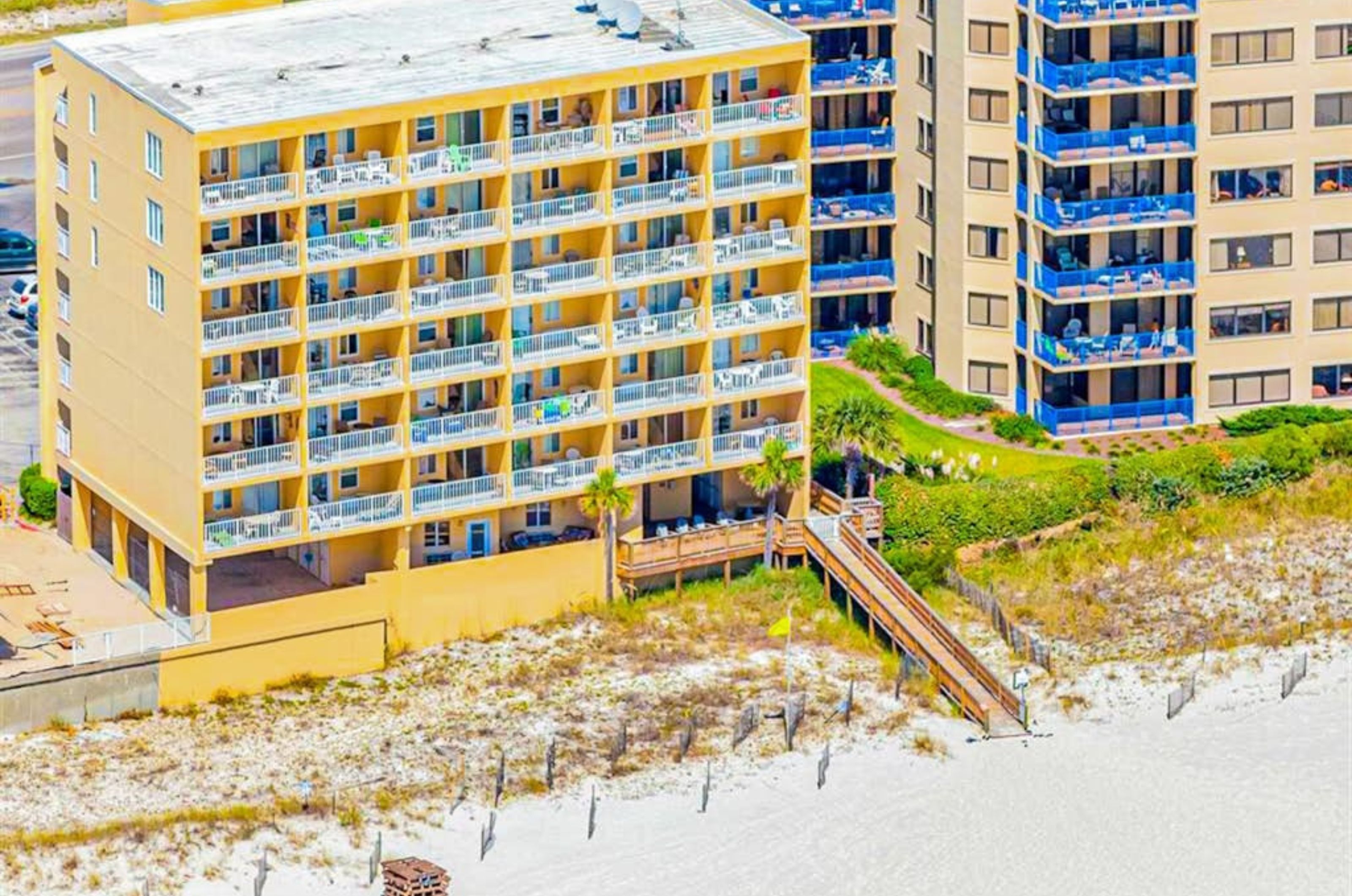 Birds eye view of Emerald Skye next to the beach in Orange Beach Alabama 