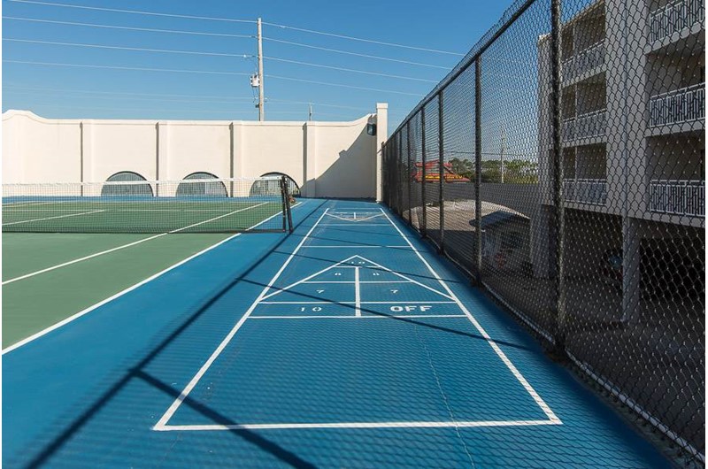 Play a game of shuffleboard at Sugar Beach in Orange Beach AL