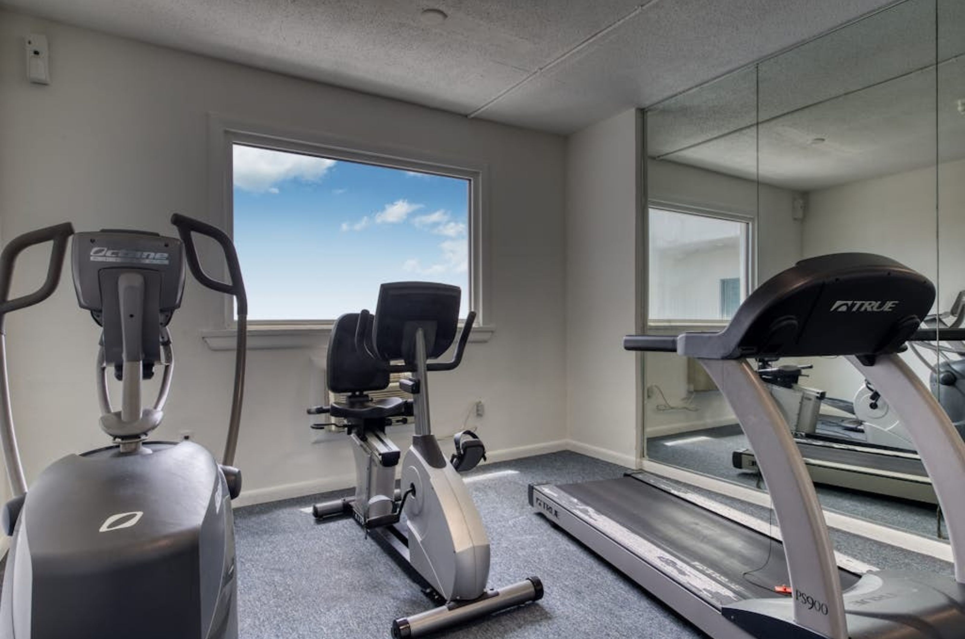 Cardio equipment in the fitness center at Palm Beach Condos in Orange Beach Alabama 