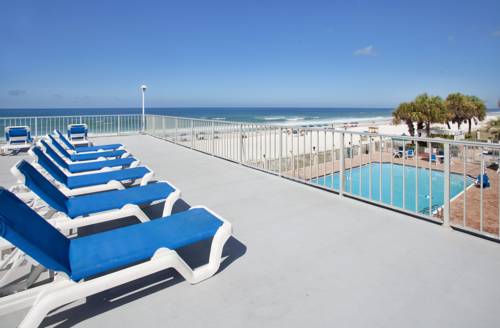 Get a view of the beach while relaxing at the pool at Beachside Resort in Panama City Beach FL 