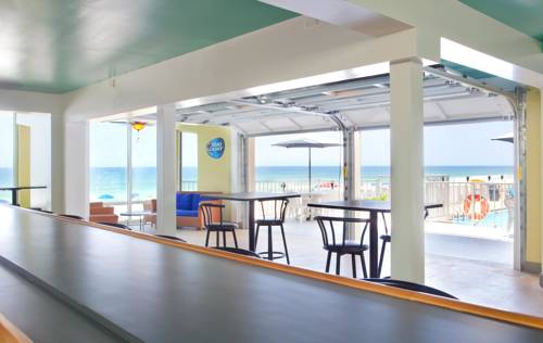 Grab lunch or a refreshing beverage at the tiki bar on site at Beachside Resort in Panama City Beach FL 