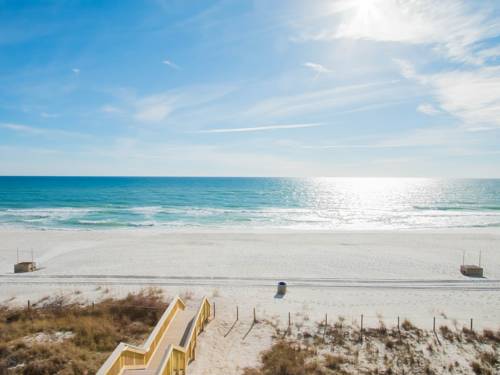 Gorgeous view of the crystal white sand and blue water of the Gulf from Beachside Resort Panama City Beach in Panama City Beach FL 