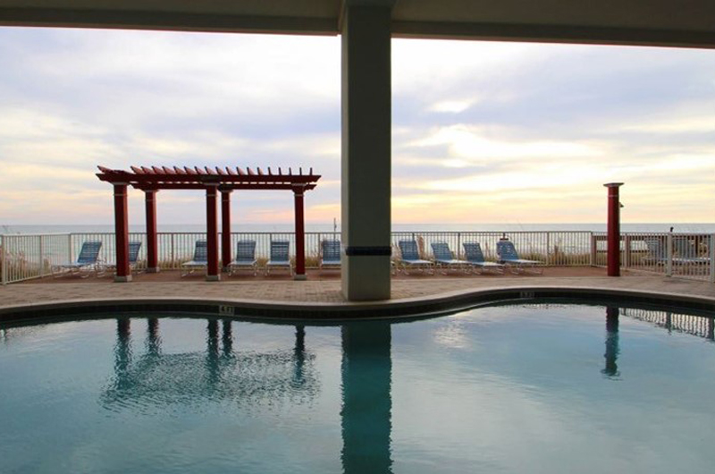 Take a dip at sunset in the outdoor pool at Majestic Beach Resort in Panama City Beach FL