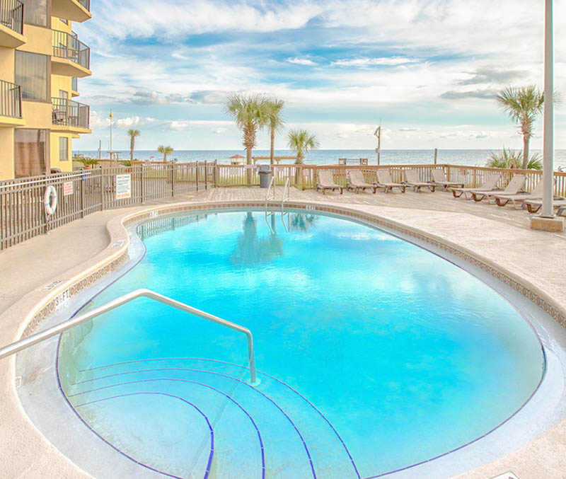 Spend you days floating in the lovely poof and watching waves roll in at Sunbird Beach Resort in Panama City Beach Florida