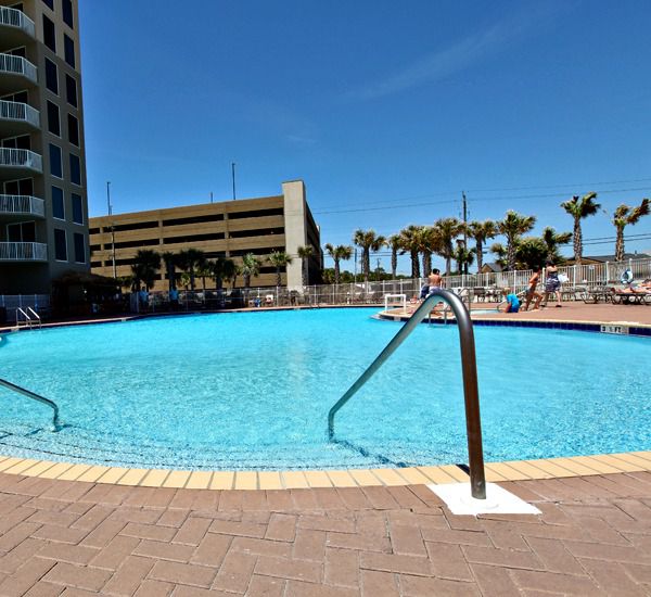 Tidewater Beach Resort in Panama City Beach Florida features 2 lagoon-sized swimming pools each with adjoining hot tub.