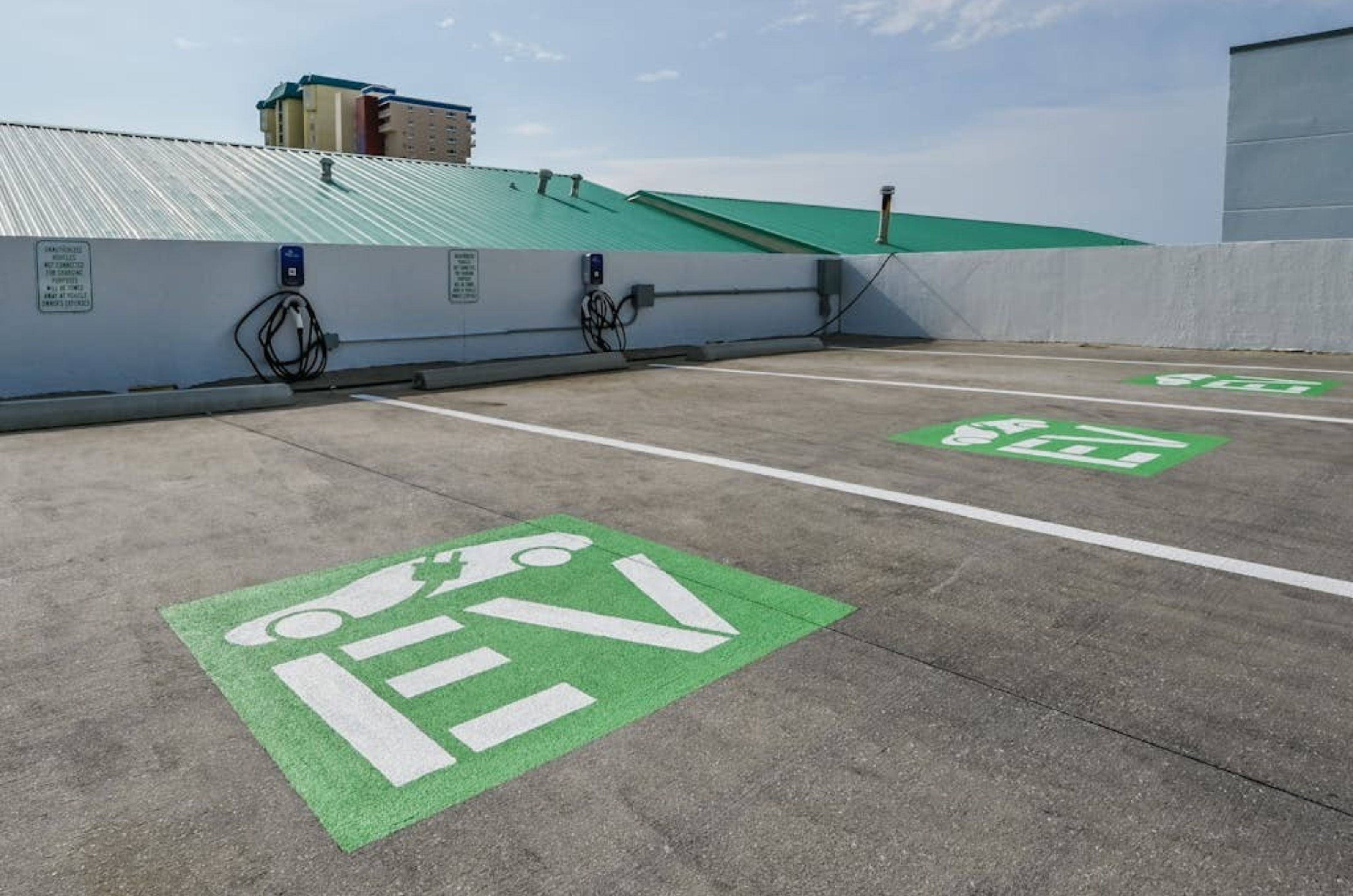 The parking spots for electric vehicles with charging stations at Pelican Beach Resort 