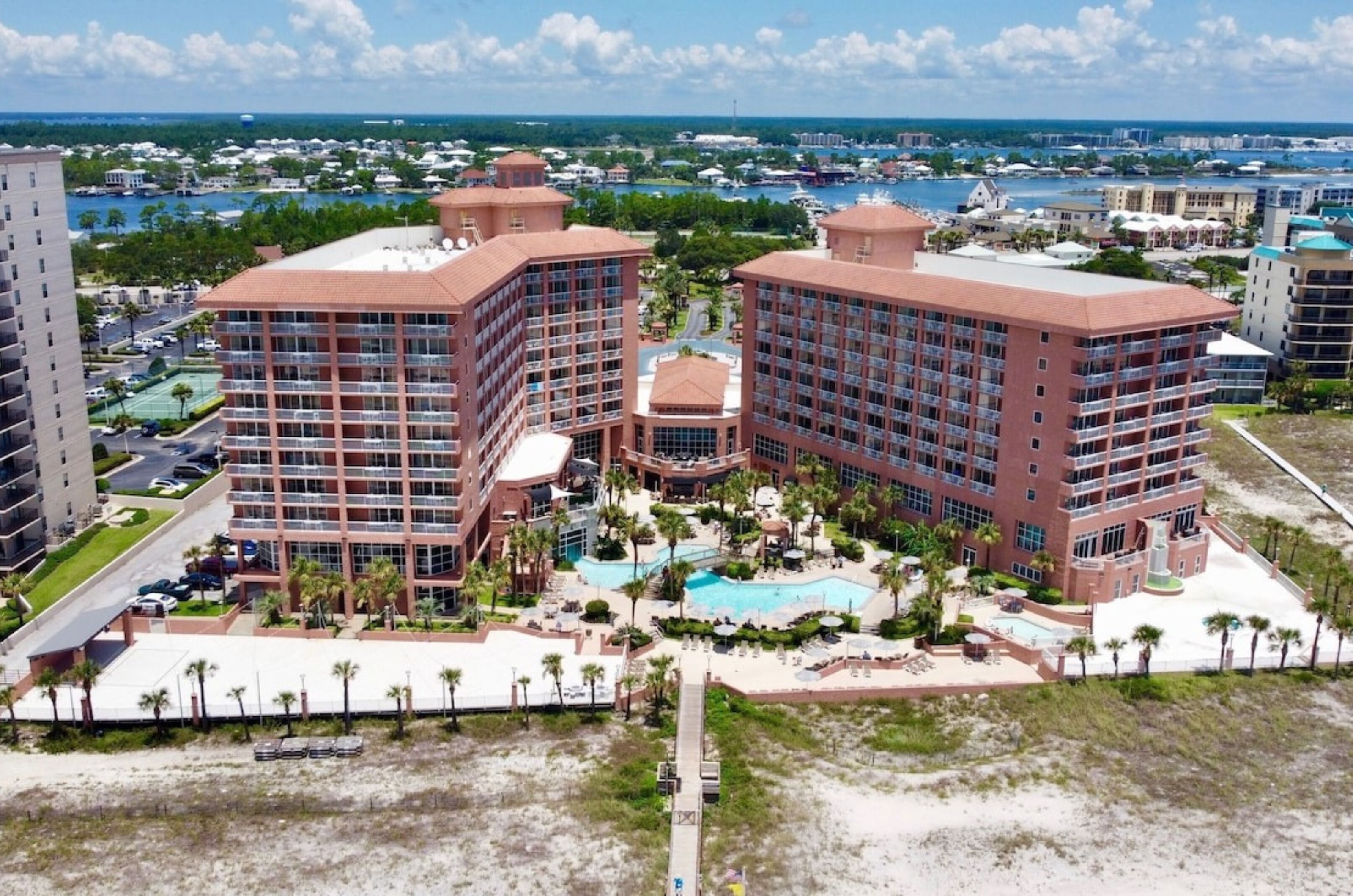 Birds eye view of Perdido Beach Resort with the outdoor pool deck and boardwalk 