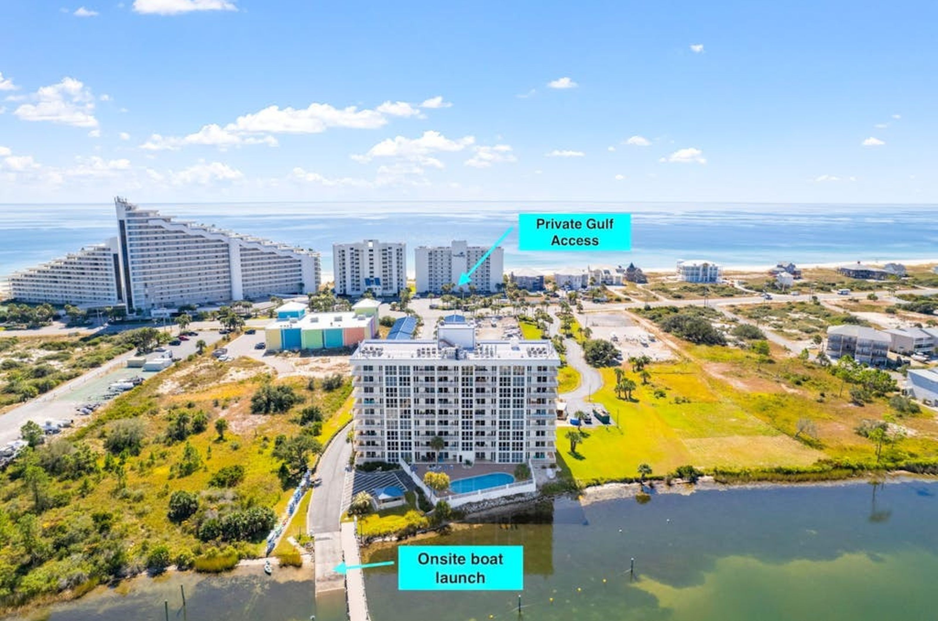 Aerial view of one riverfront and two beachfront condominums in Perdido Key Florida	