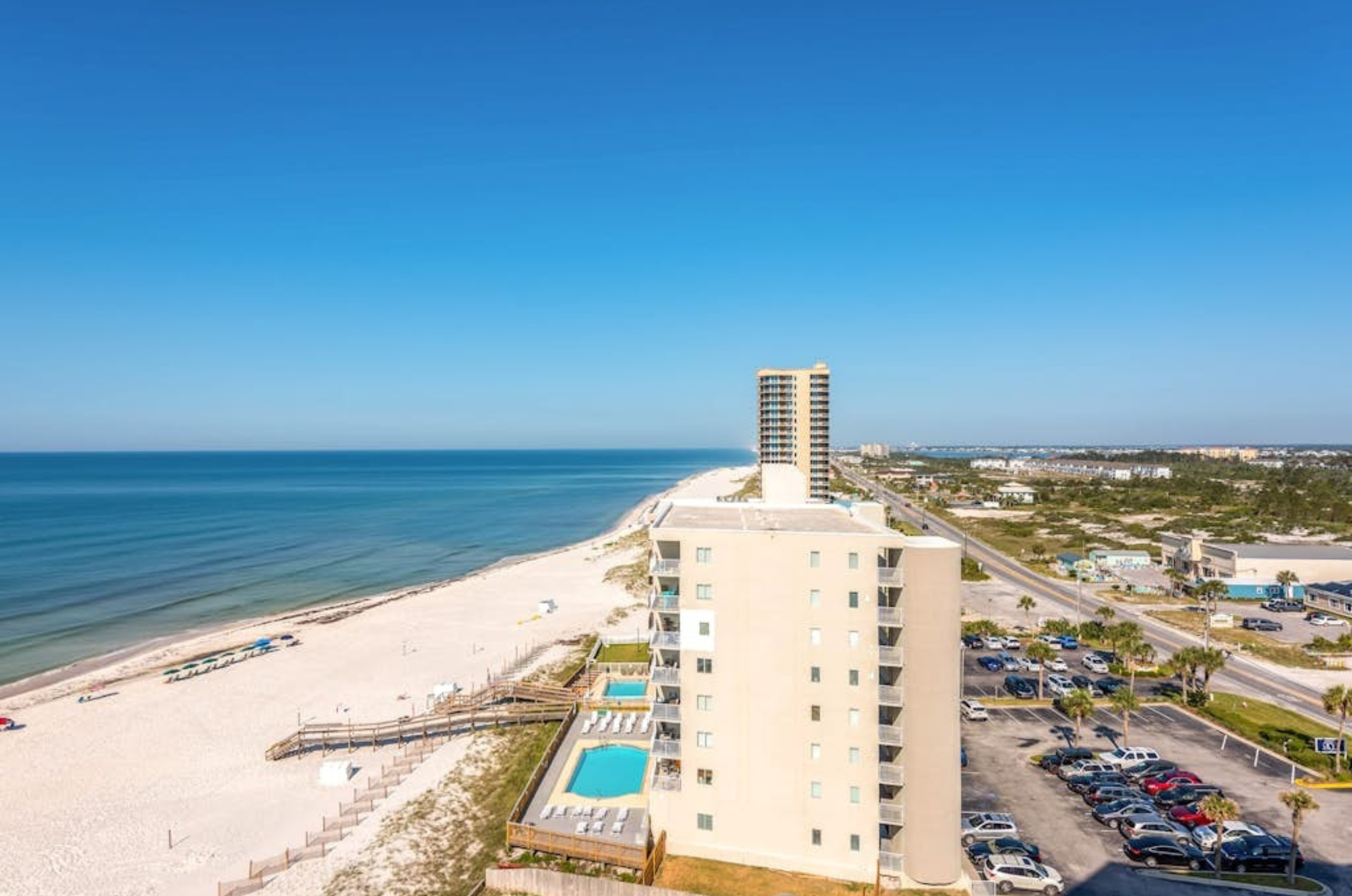 View looking down the coast of Perdido Sun and the Gulf in front of the building