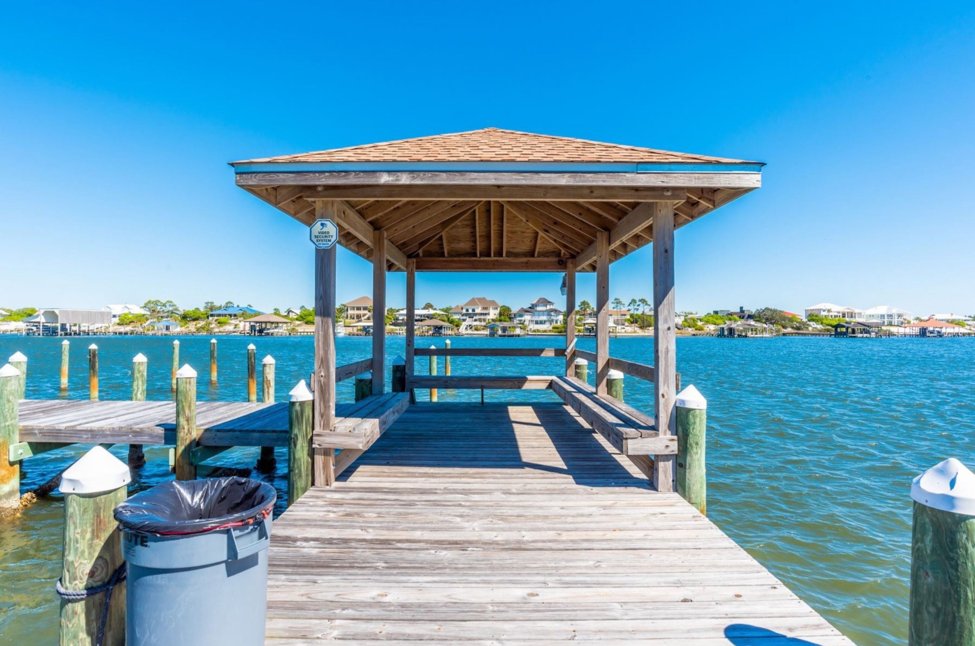 The wooden dock on Ole River at Perdido Towers