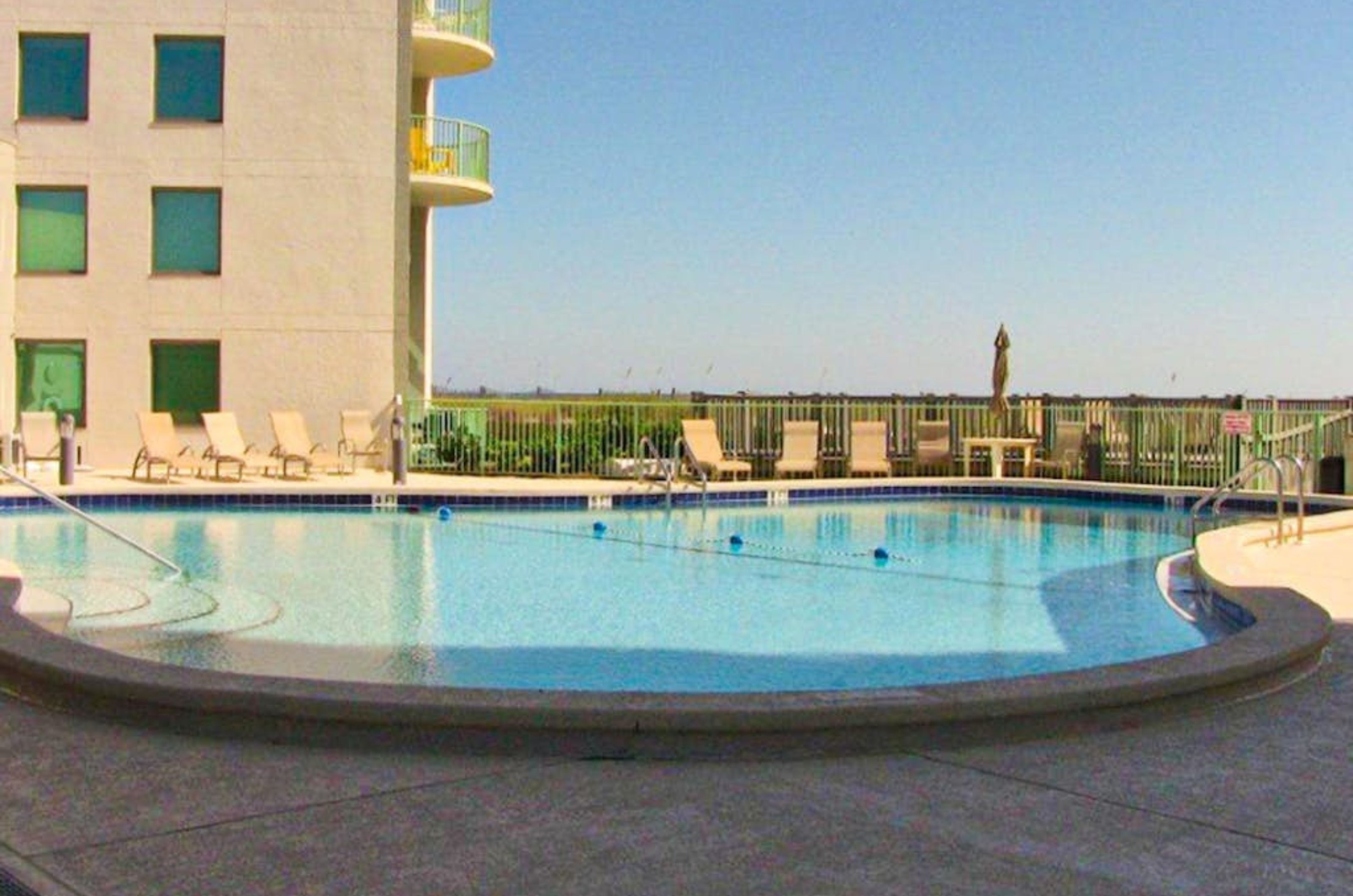 The crystal clear swimming pool at Perdido Towers in Perdido Key Florida 