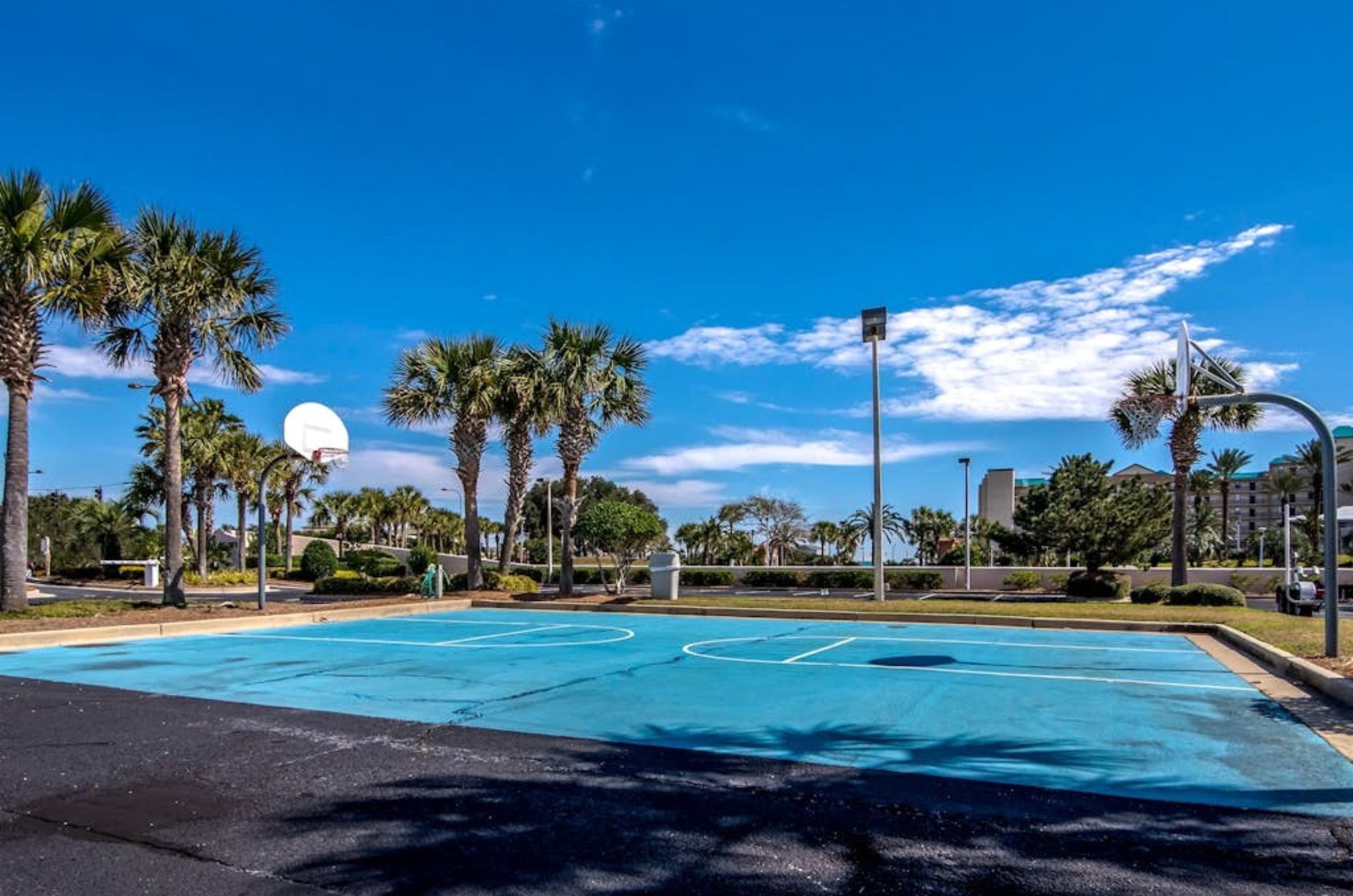 The outdoor basketball court at Phoenix II in Orange Beach Alabama 