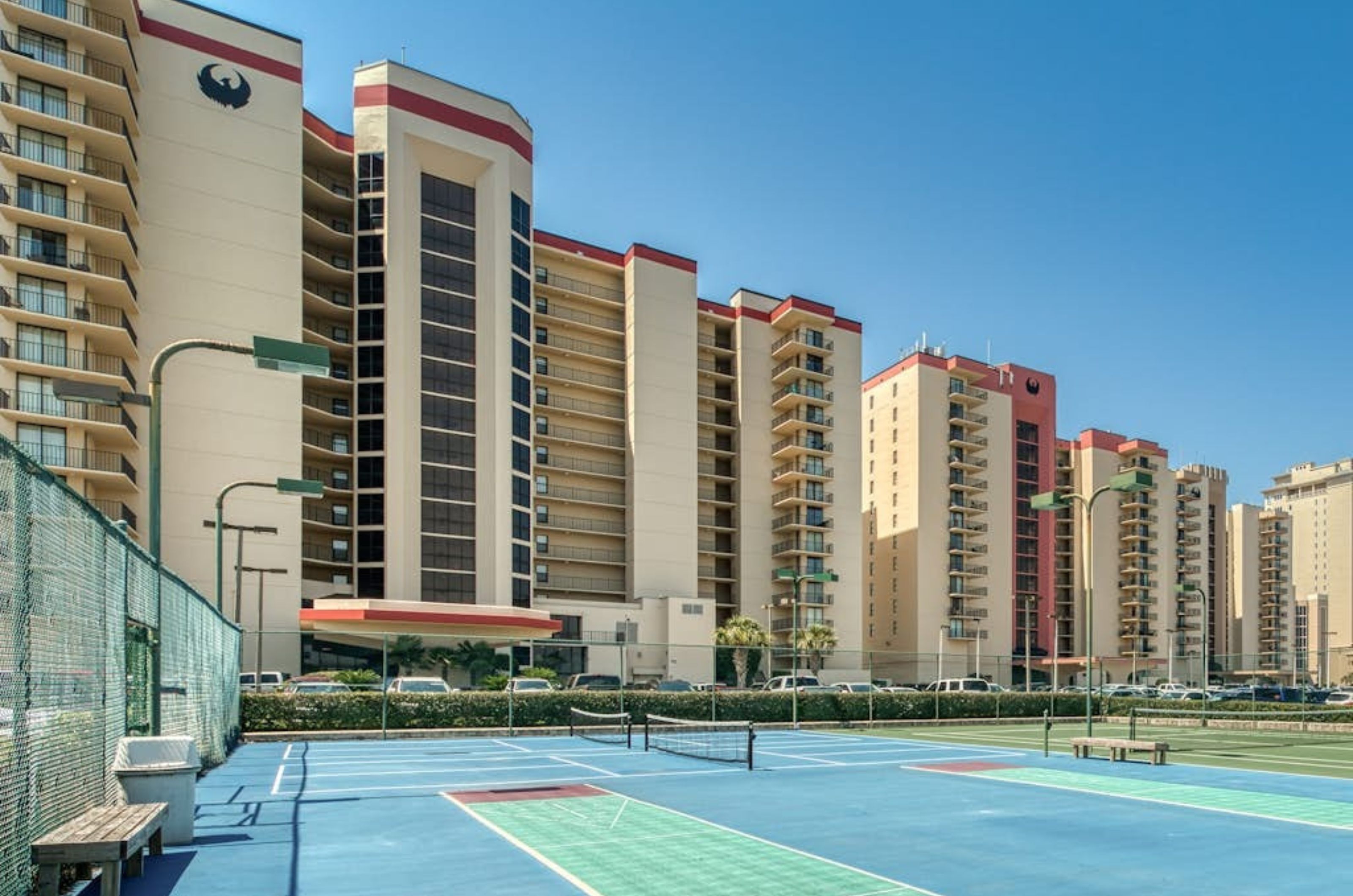 The outdoor tennis courts in front of Phoenix I in Orange Beach Alabama 