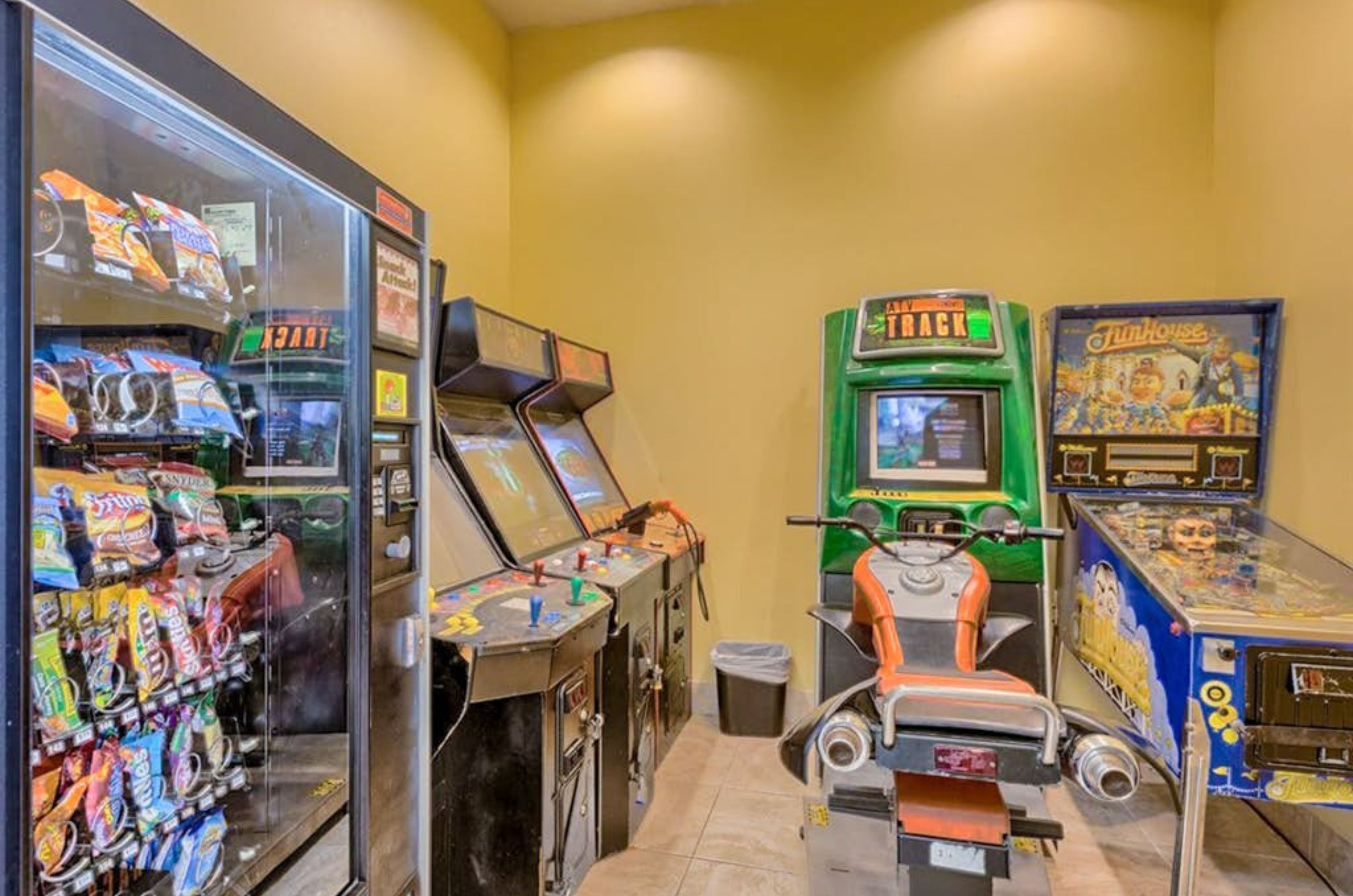 The game room with video games and a vending machine at Phoenix I 
