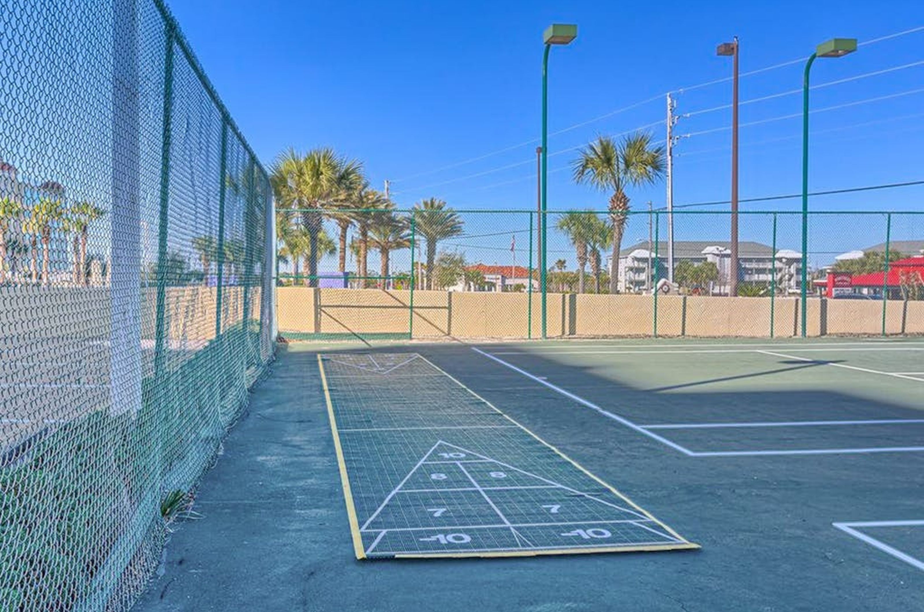 The outdoor shuffleboard courts at Phoenix I in Orange Beach Alabama 