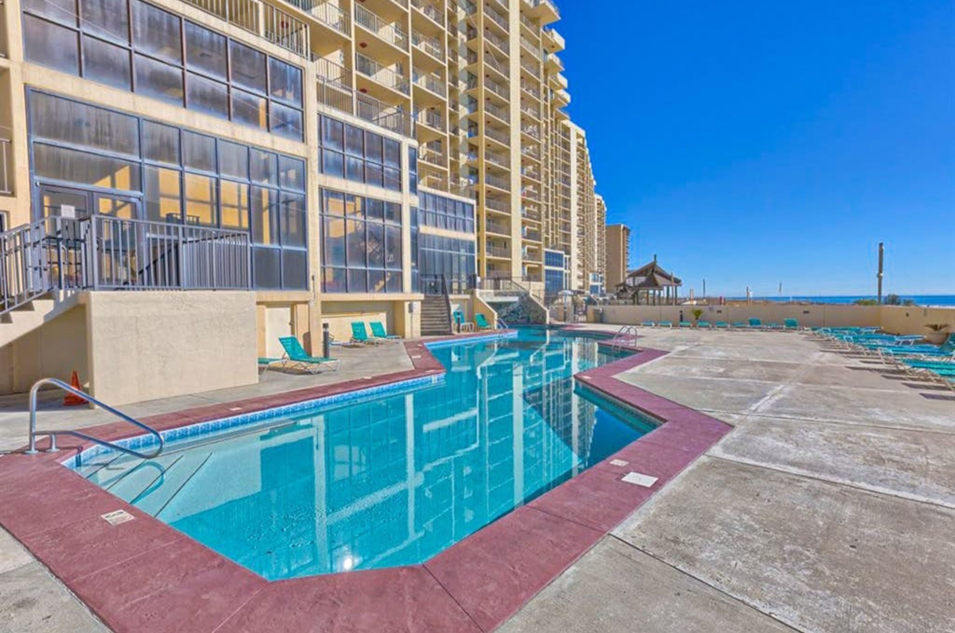 The outdoor pool in front of Phoenix I condominiums in Orange Beach Alabama