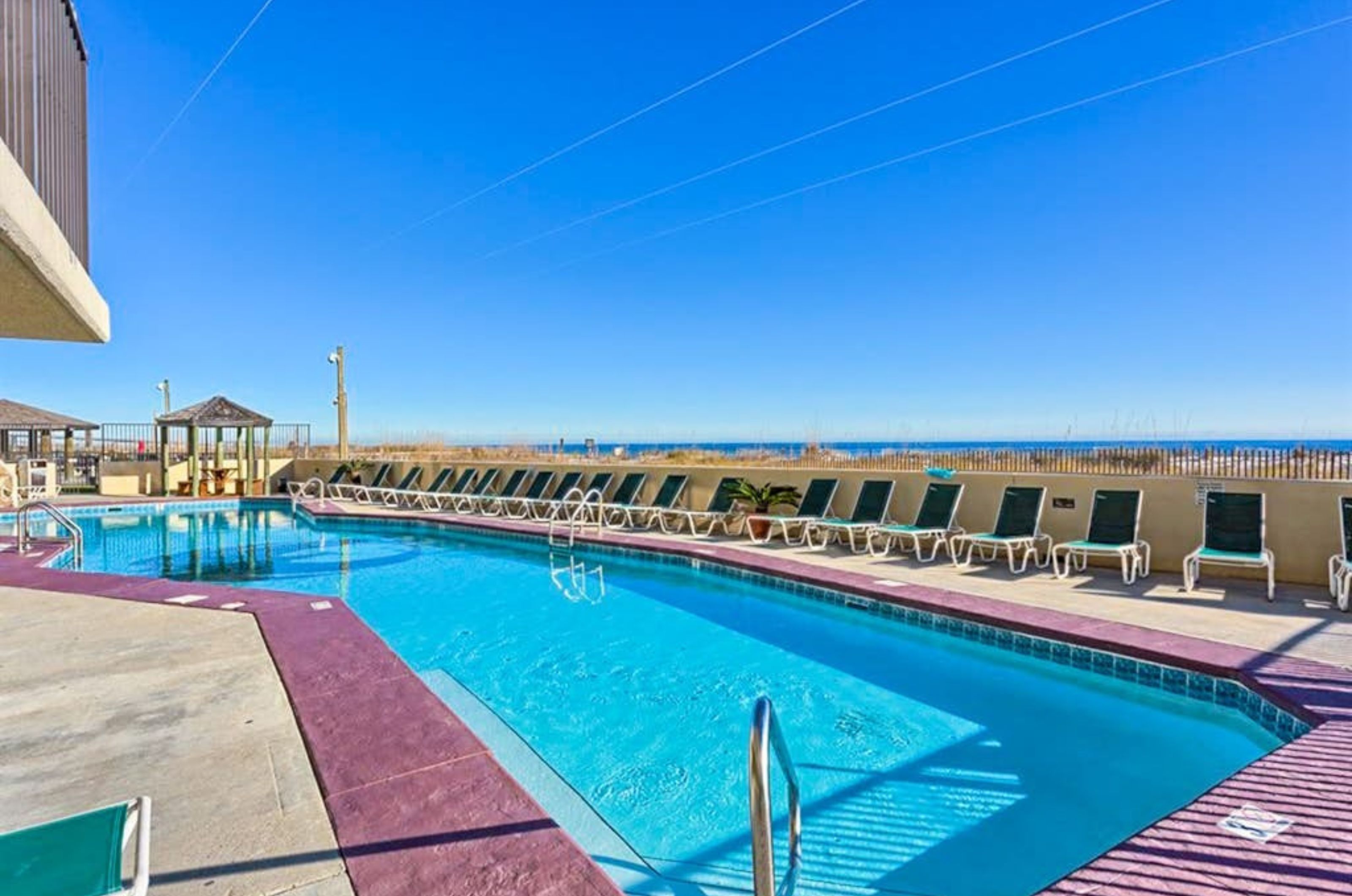 The outdoor swimming pool at Phoenix III in Orange Beach Alabaama 