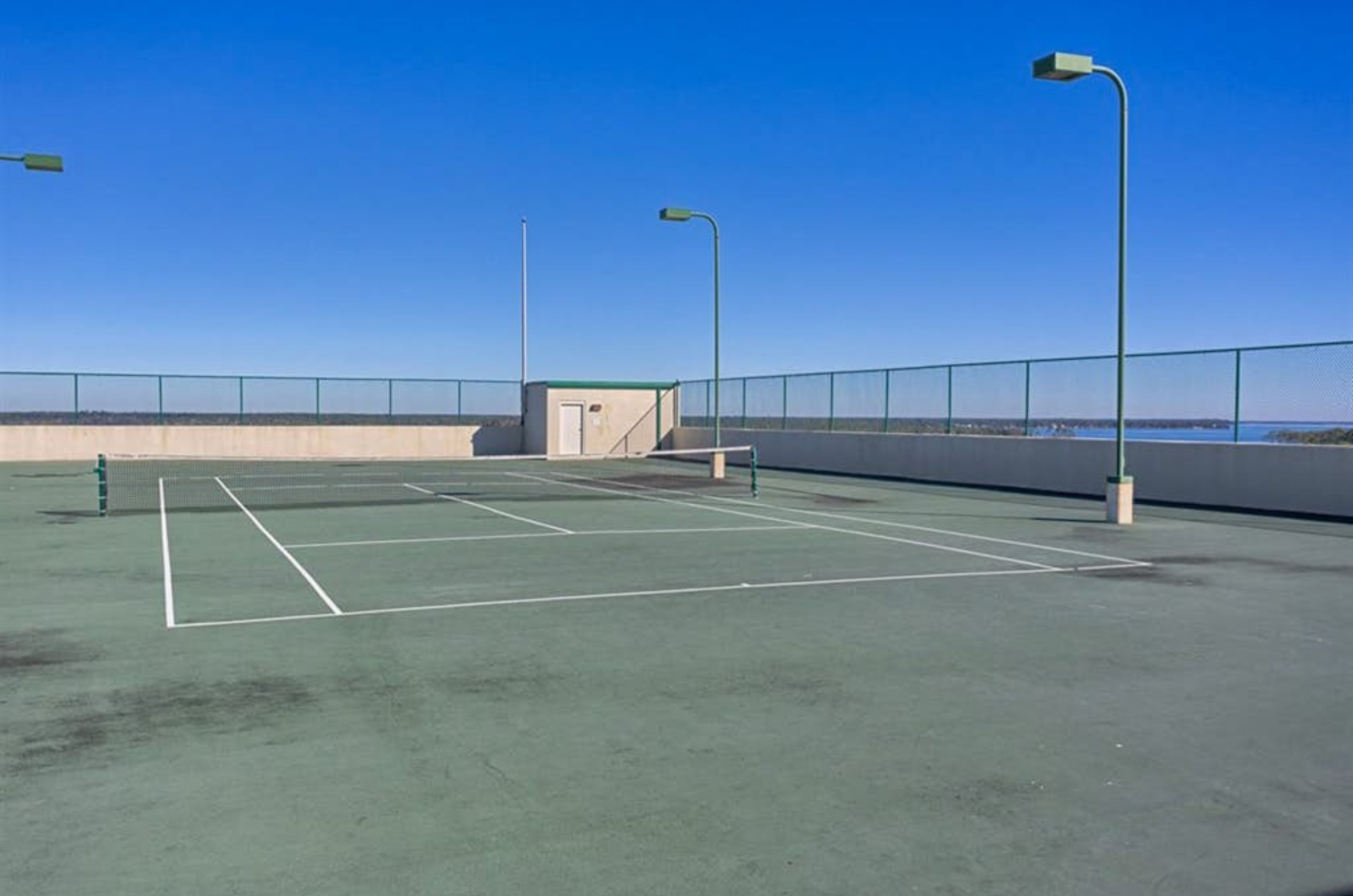 The outdoor tennis courts at Phoenix on the Bay