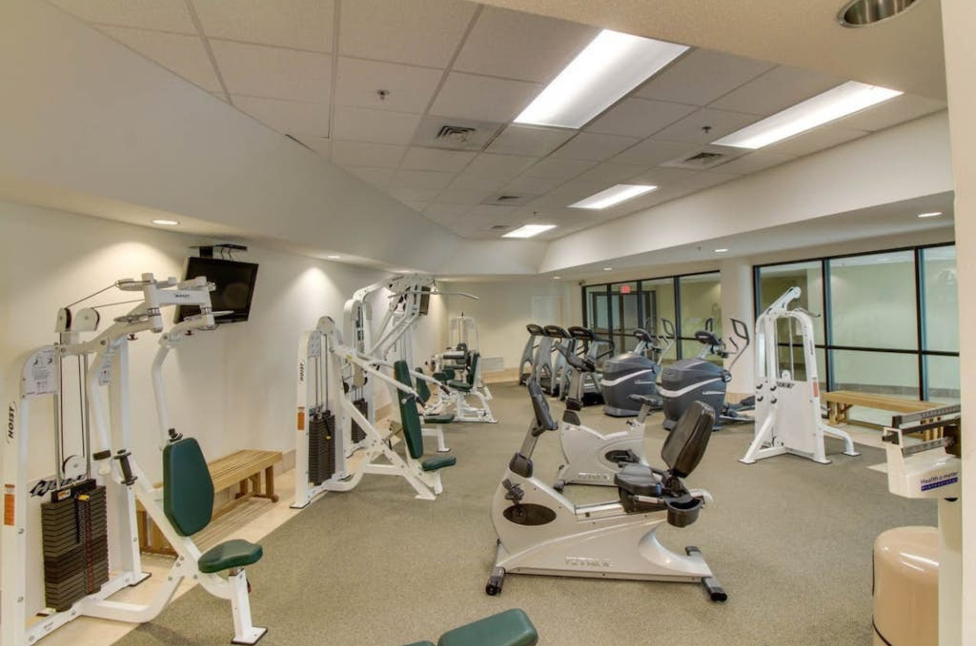 The on-site fitness center with cardio and strength equipment at Phoenix on the Bay