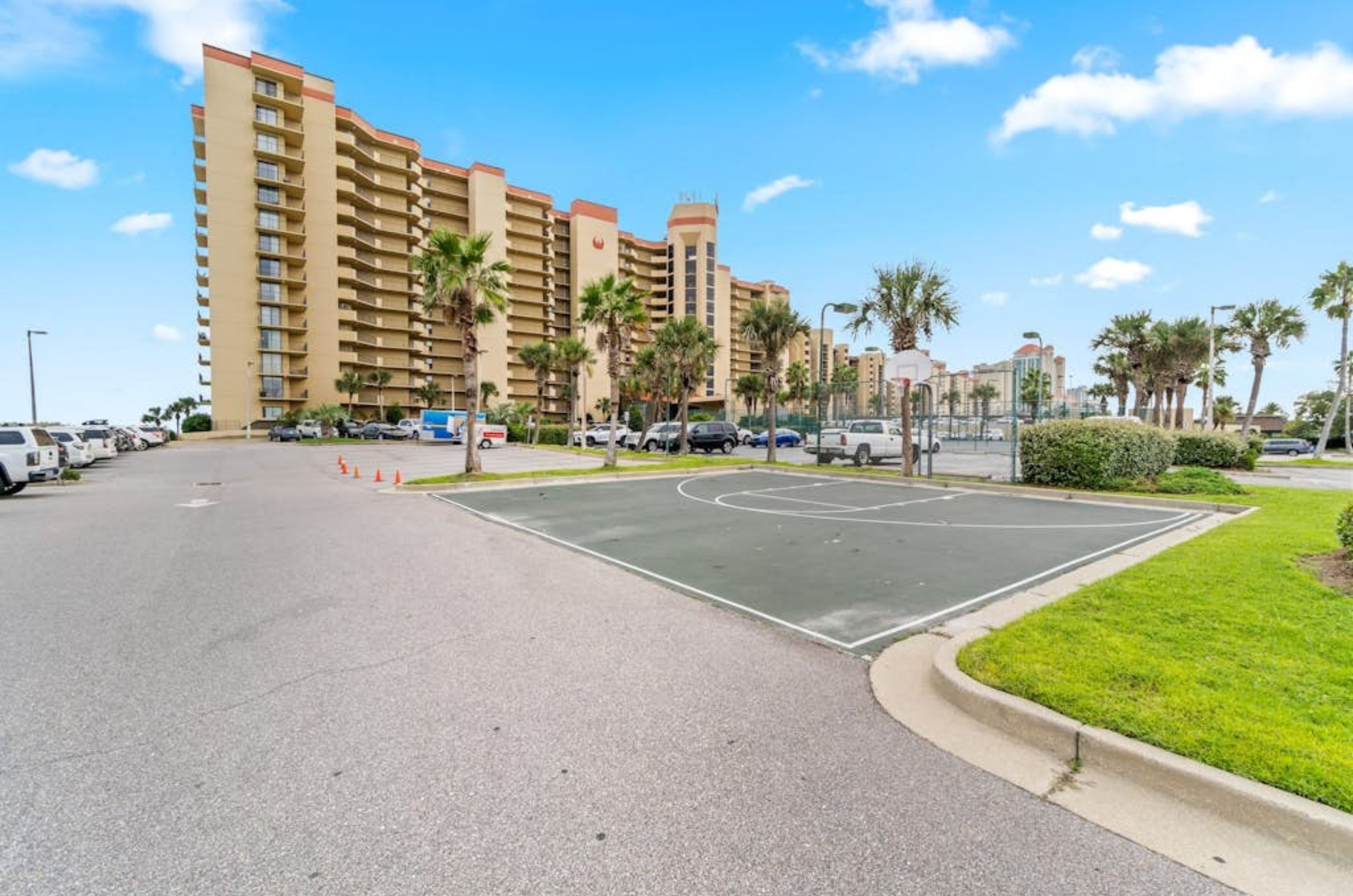 View from the street of Phoenix V with the parking lot out front 