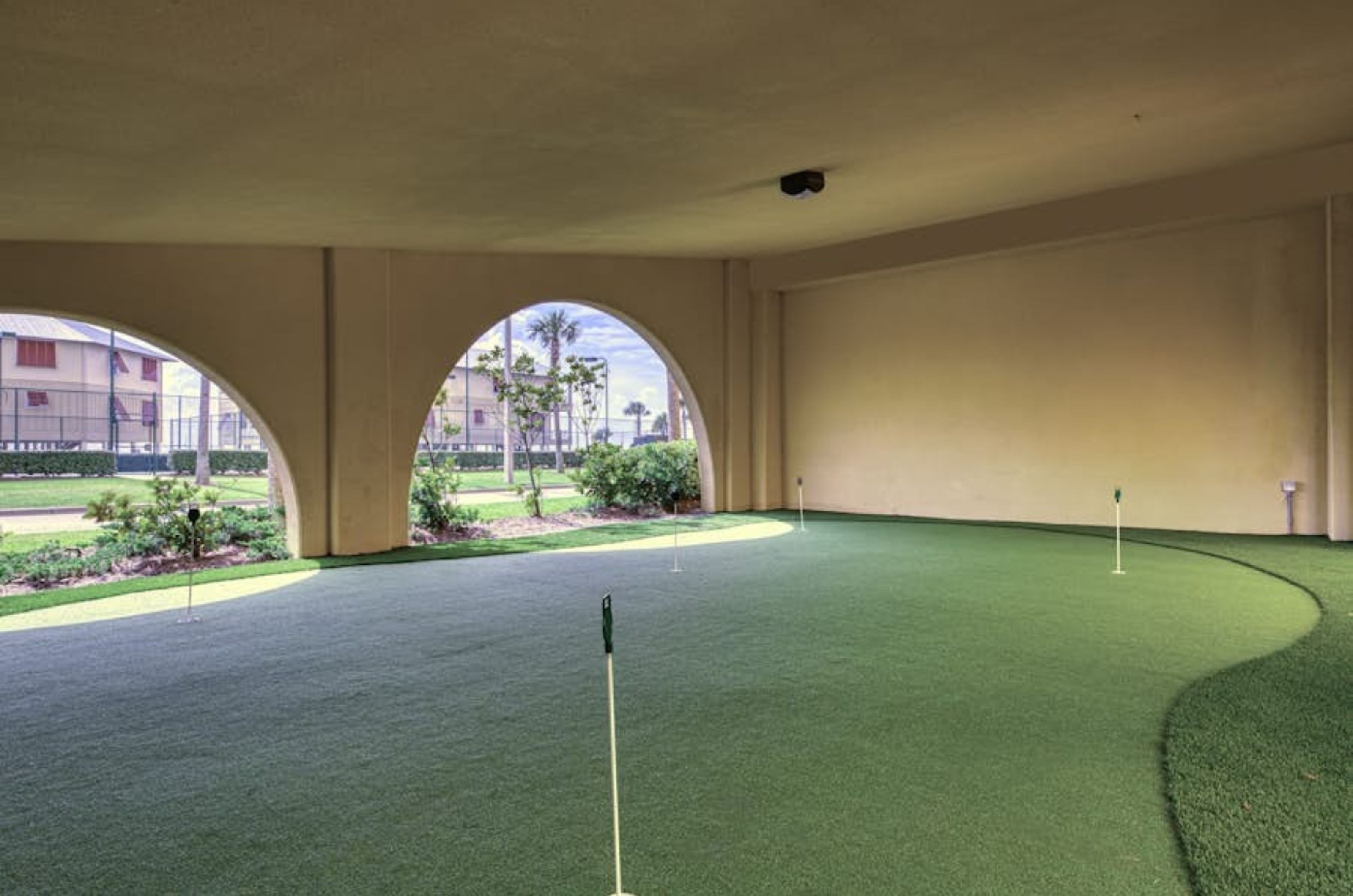 The putting green under Phoenix West II in Orange Beach Alabama 