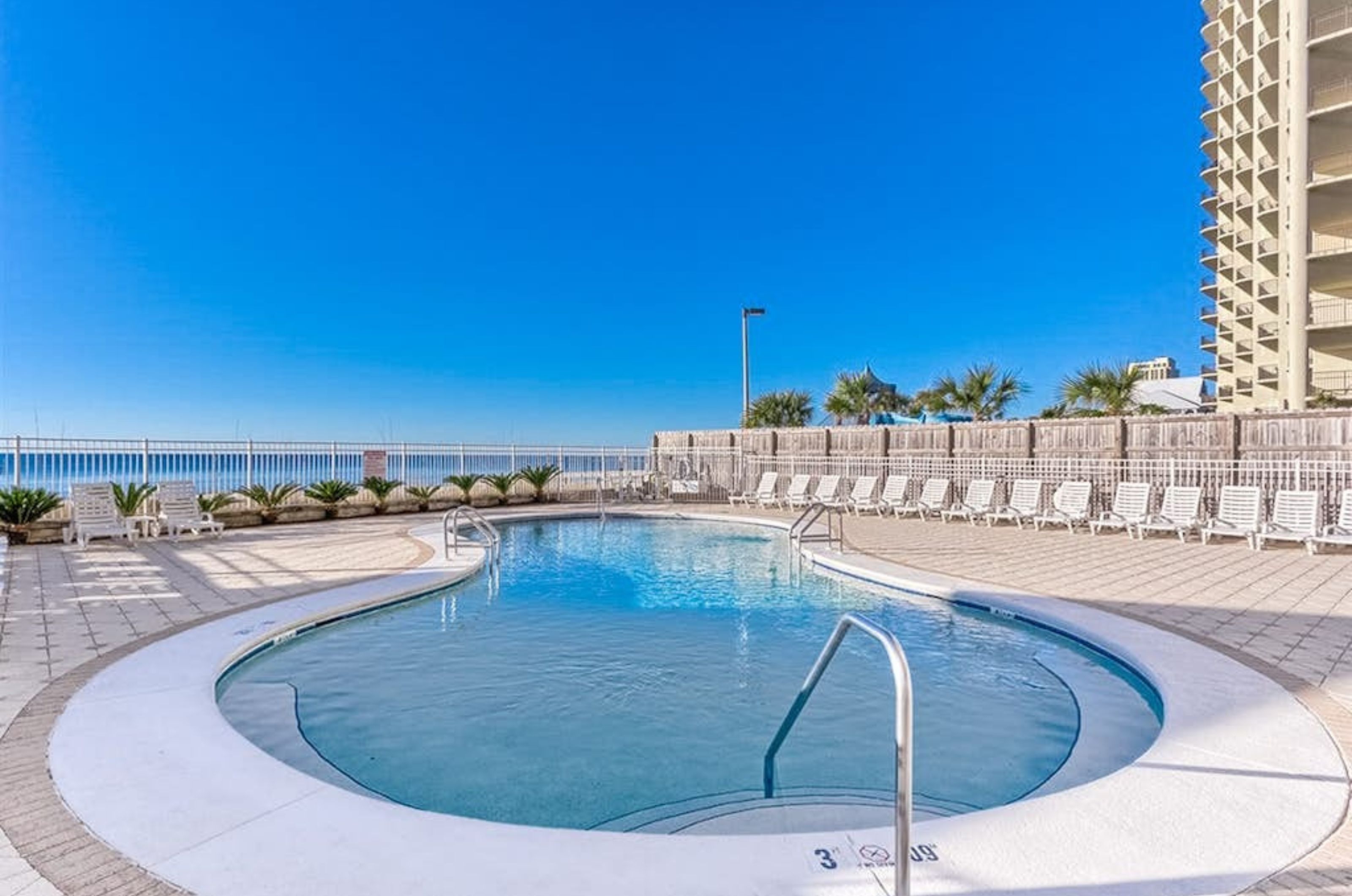 The stairs to the outdoor pool at Romar Tower in Orange Beach Alabama