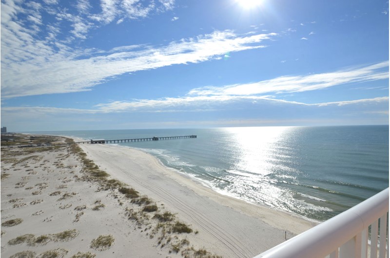 See down the coastline off your balcony at Royal Palms in Gulf Shores AL