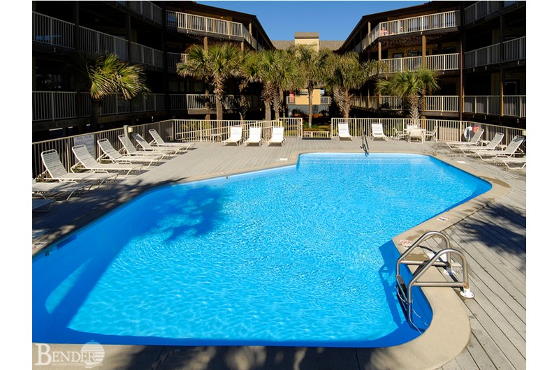 Enjoy a swim in the gorgeous blue pool water at Sandpiper in Gulf Shores AL