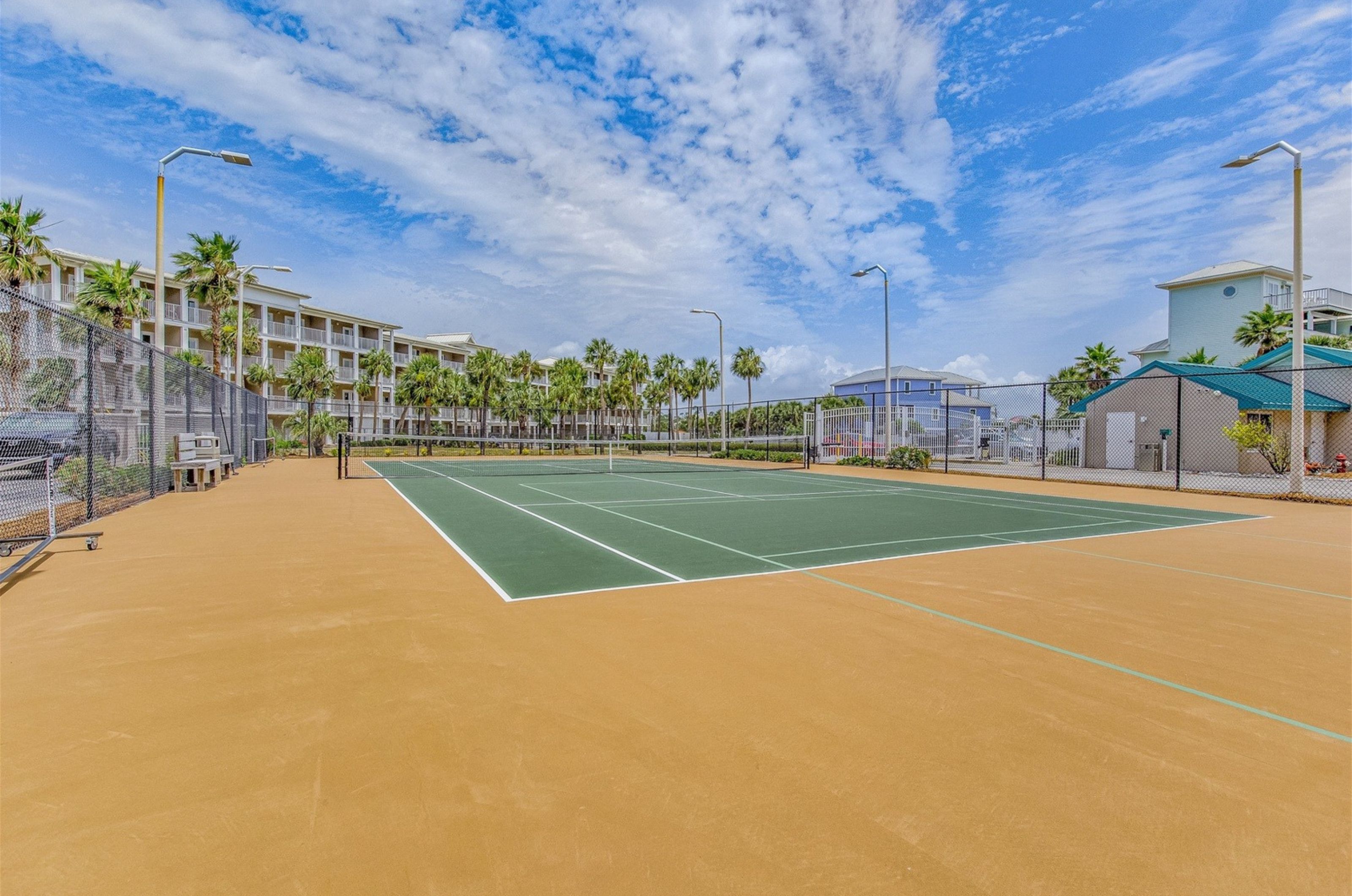 The outdoor tennis courts in front of Sandy Key