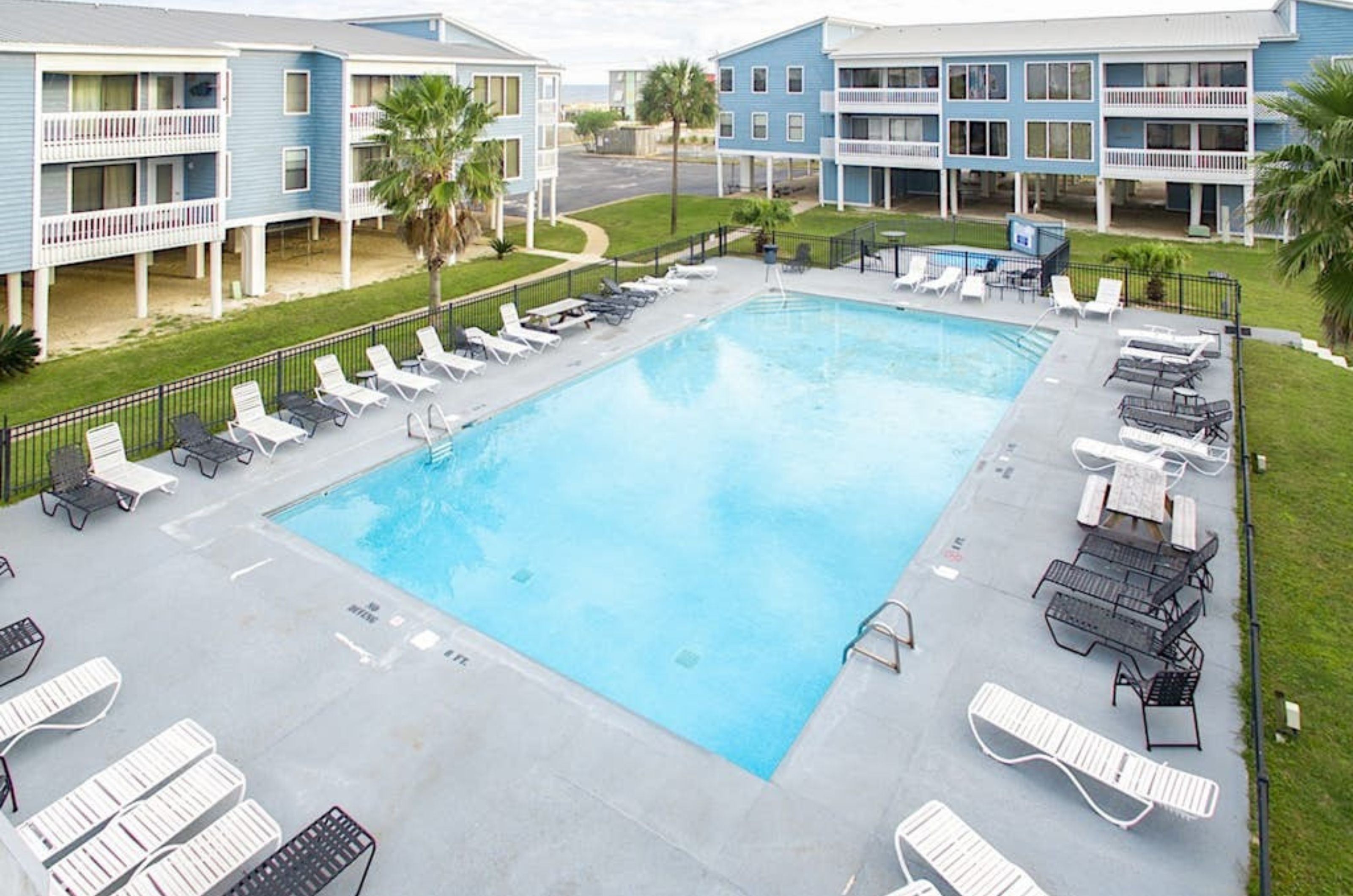 Aerial view of a spacious outdoor swimming pool at Sea Oats in Gulf Shores Alabama	