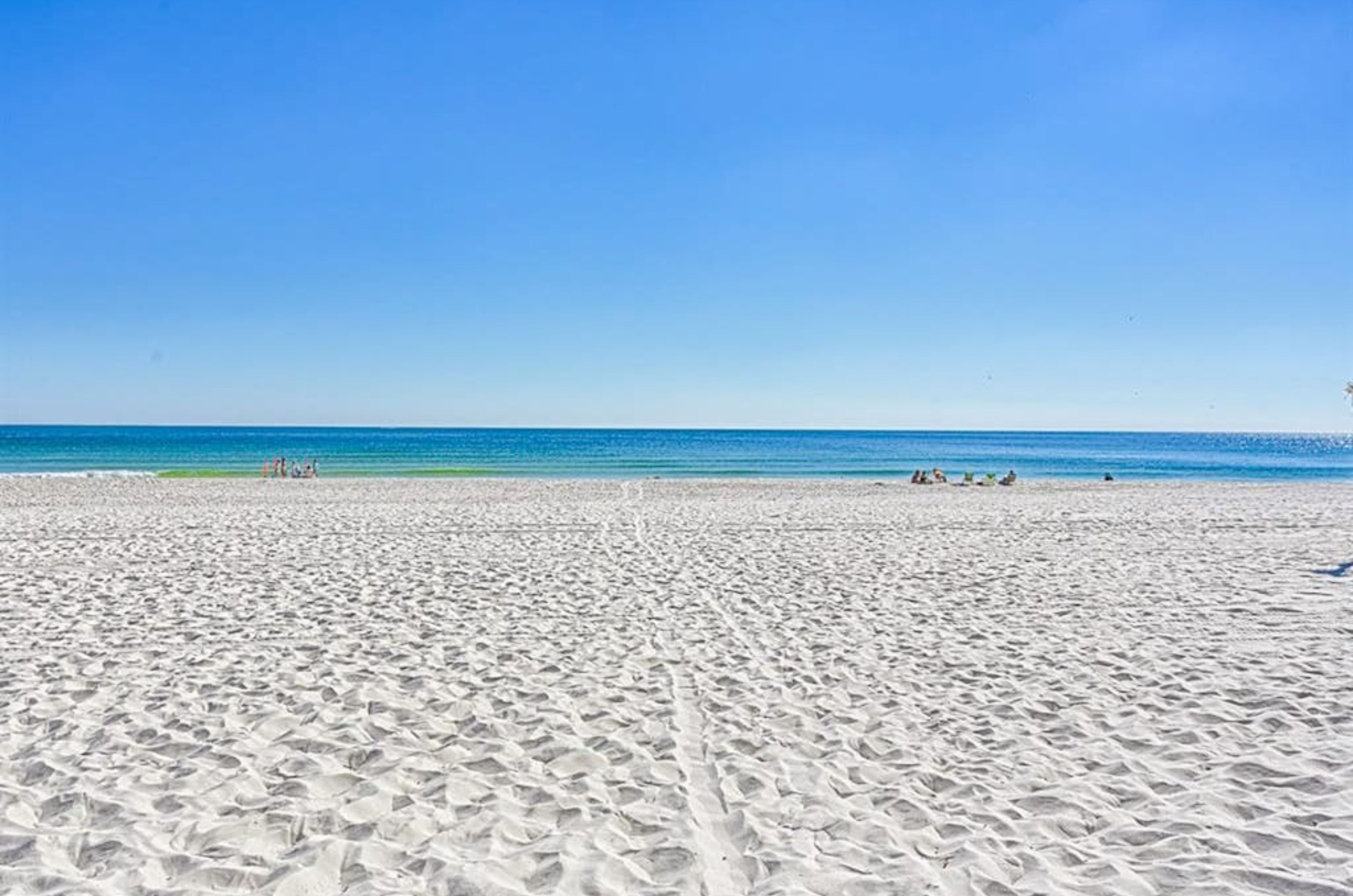 The sandy white beaches and Gulf in front of Seascape 