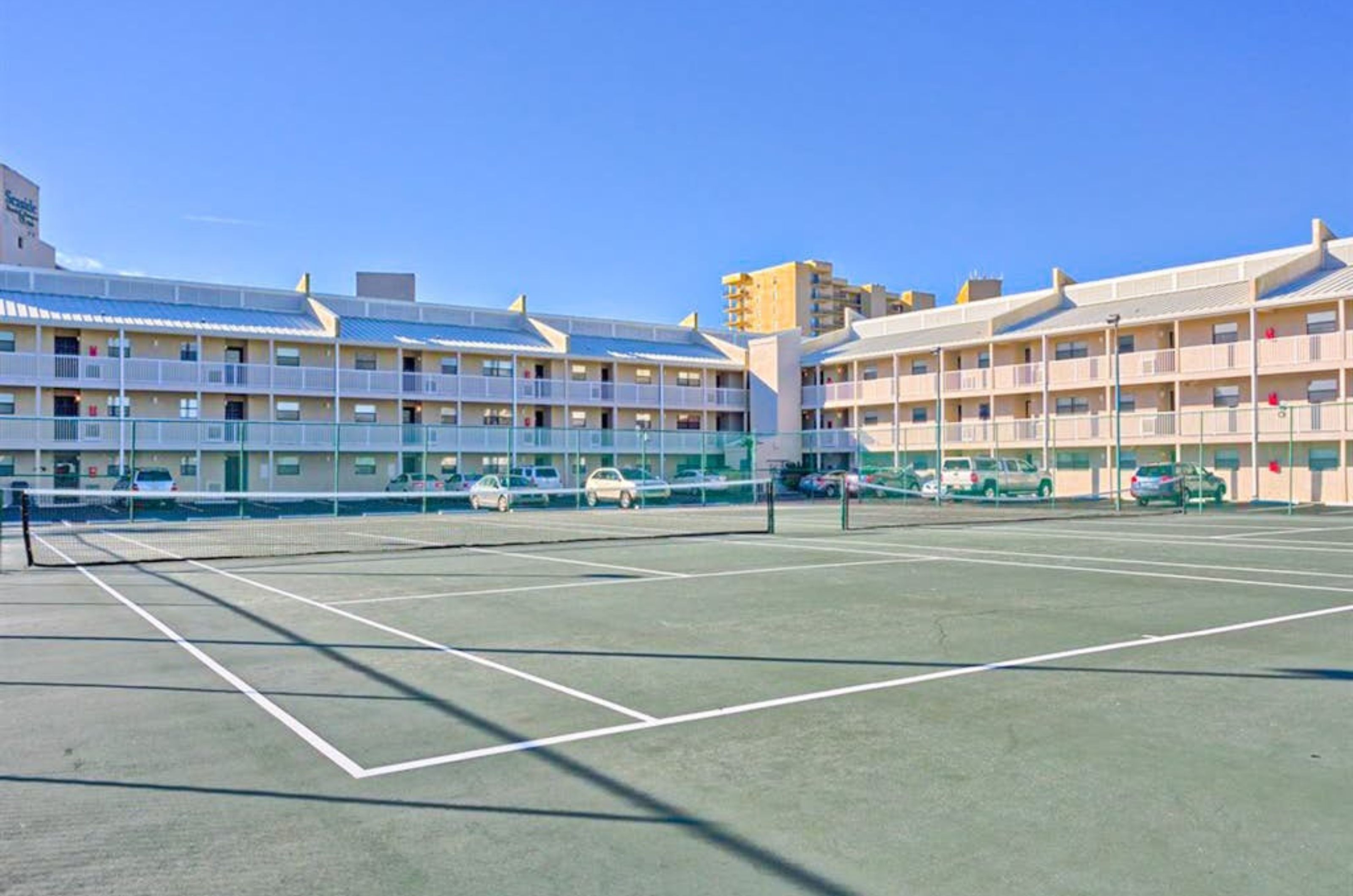 The outdoor tennis courts in front of Seaside Beach and Racquet Club