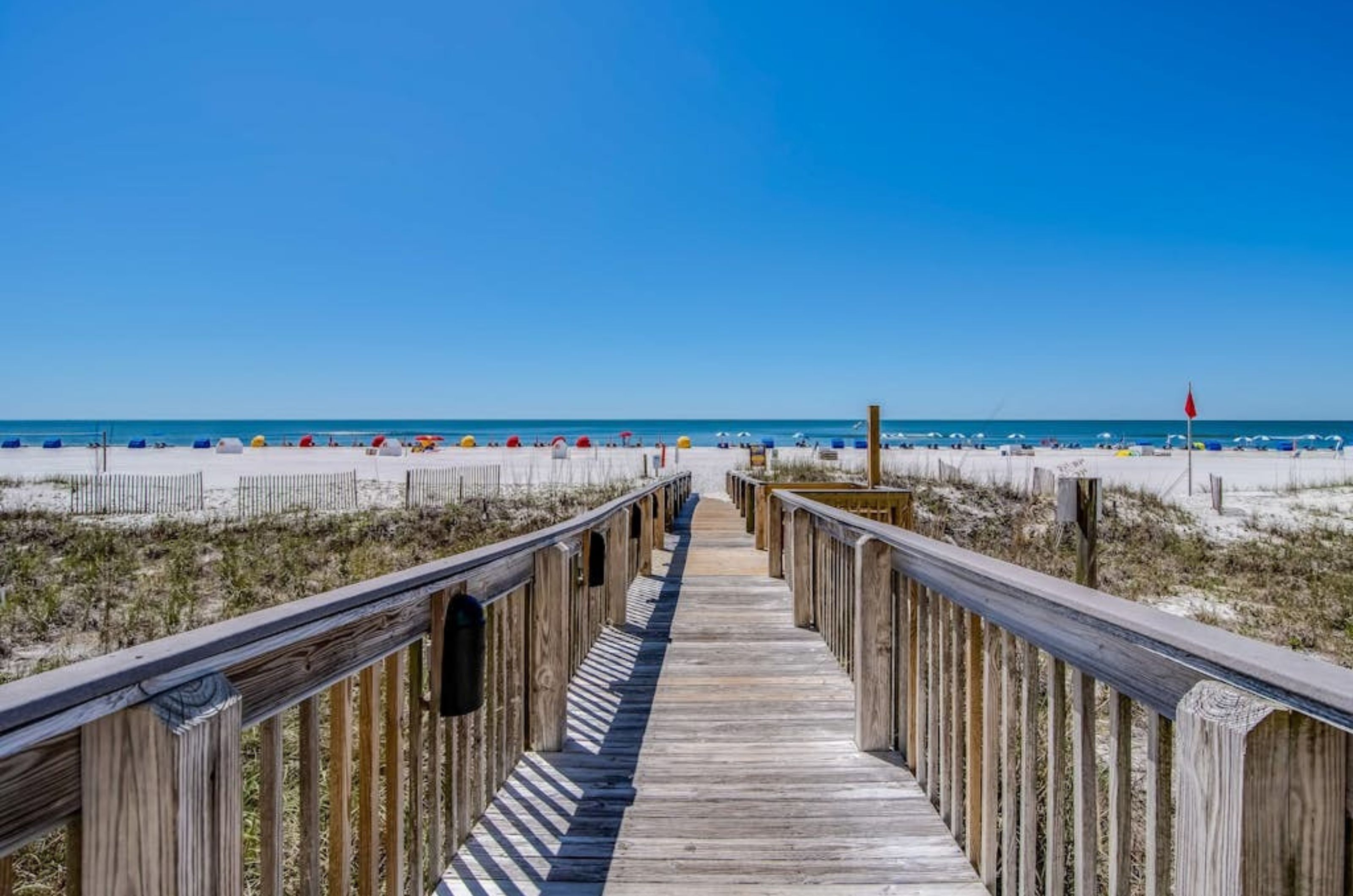 The wooden boardwalk leading to the beach at Shoalwater Condominiums 