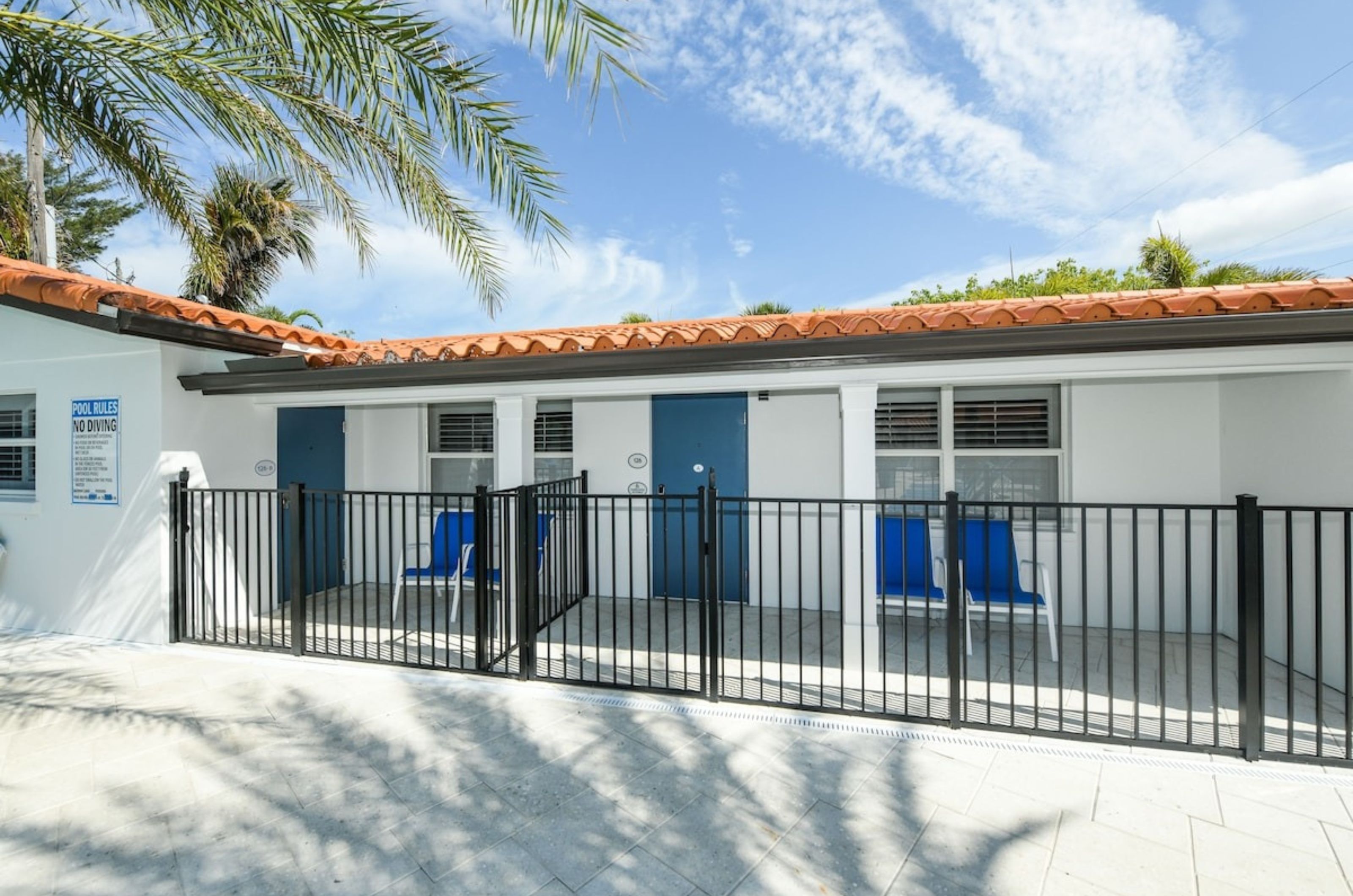 The outdoor patios in front of the rooms at Siesta Key Beach Resort and Suites 