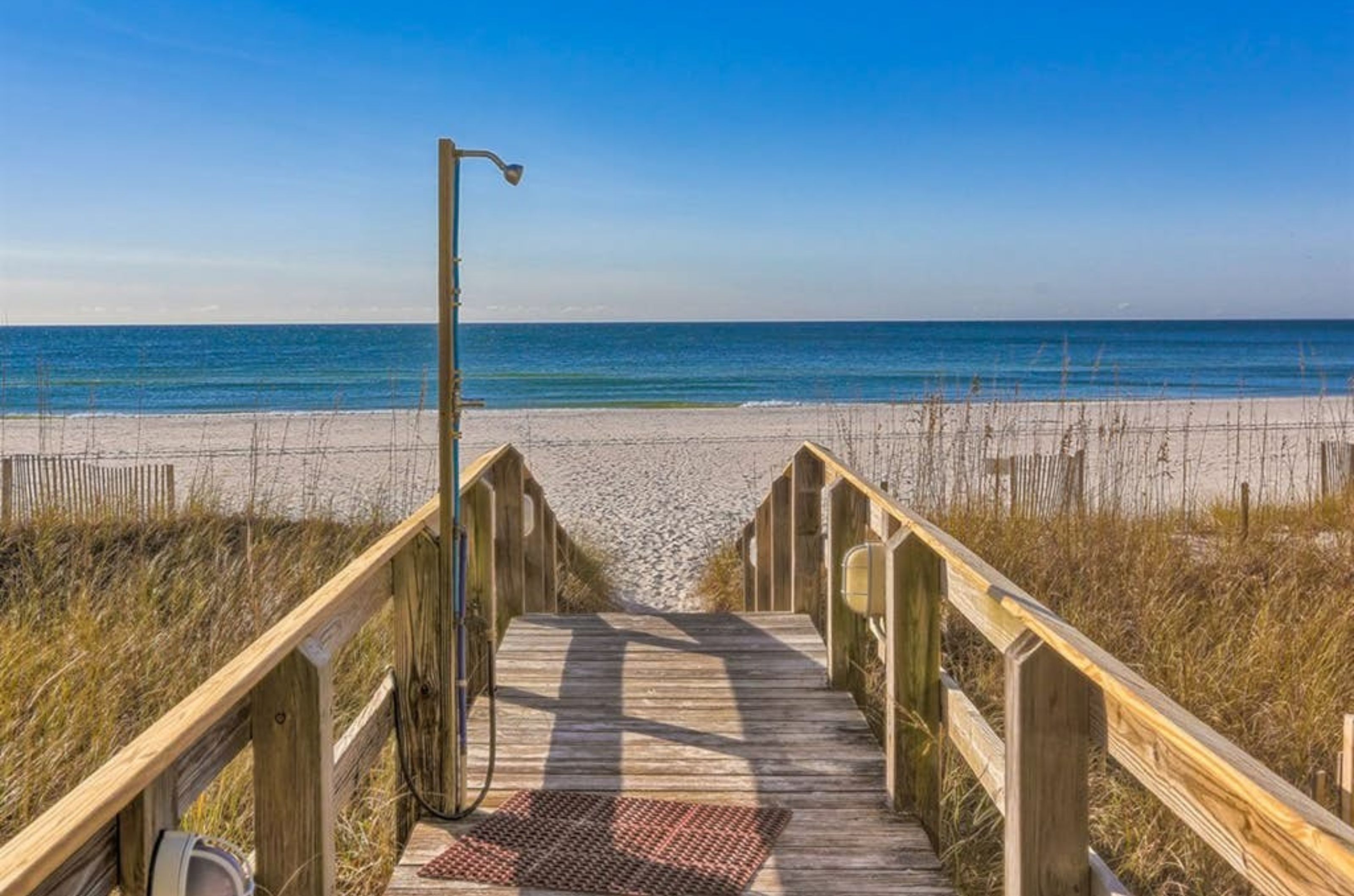 A wooden boardwalk leading to the beach in Orange Beach Alabama 