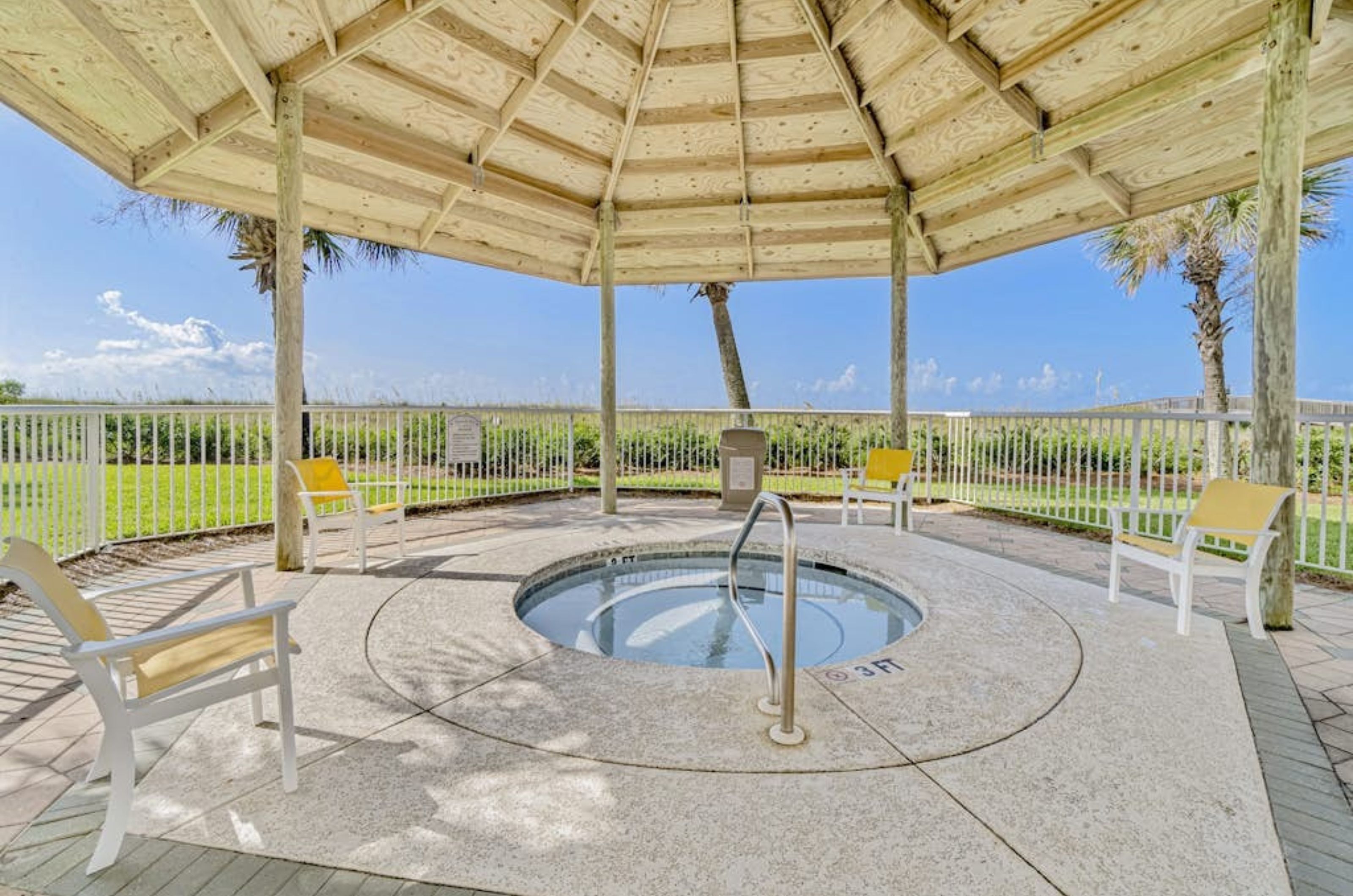 The outdoor covered hot tub at Spanish Key Condominiums