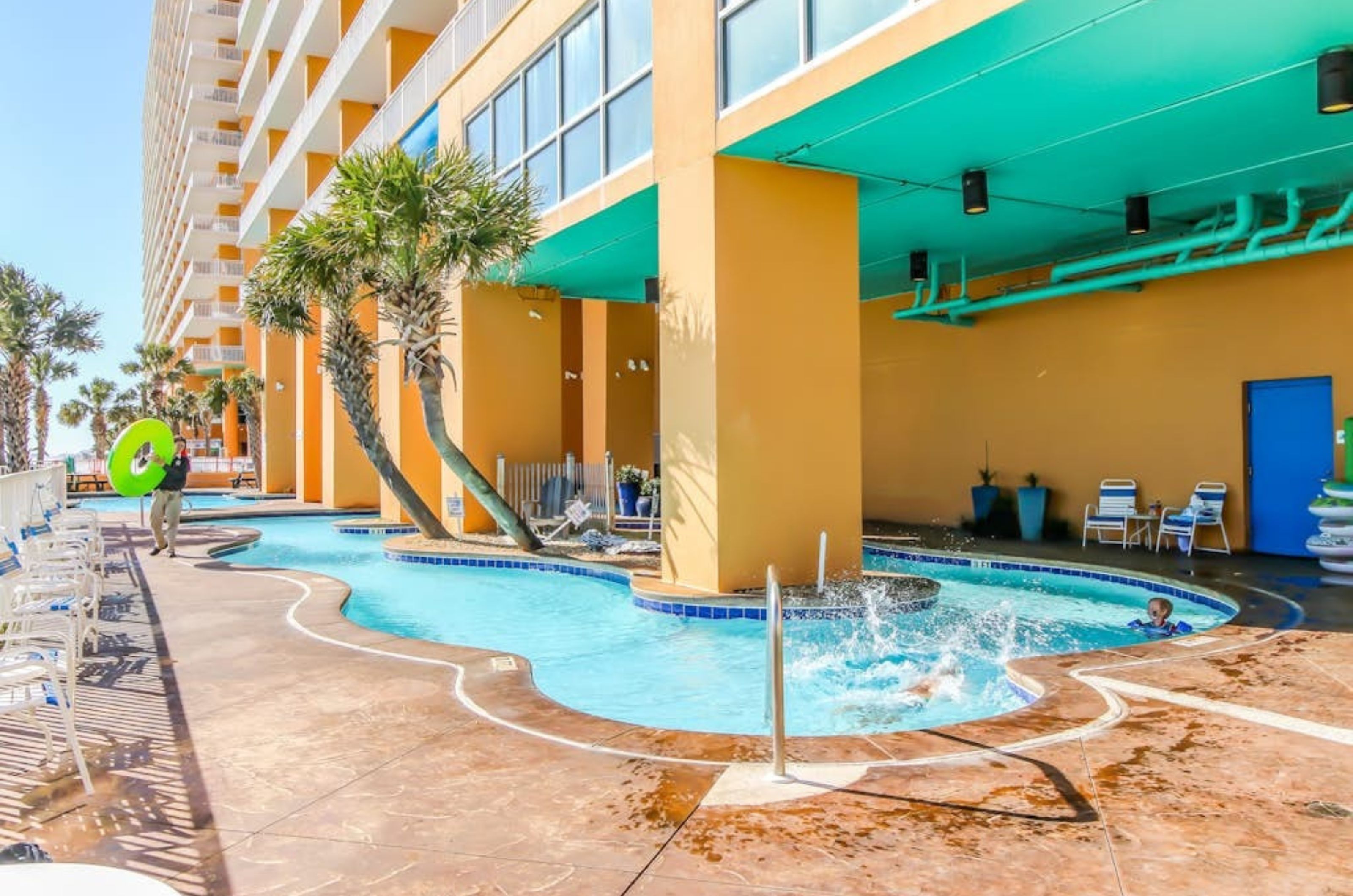 The indoor and outdoor lazy river in front of Splash Resort in Panama City Beach Florida