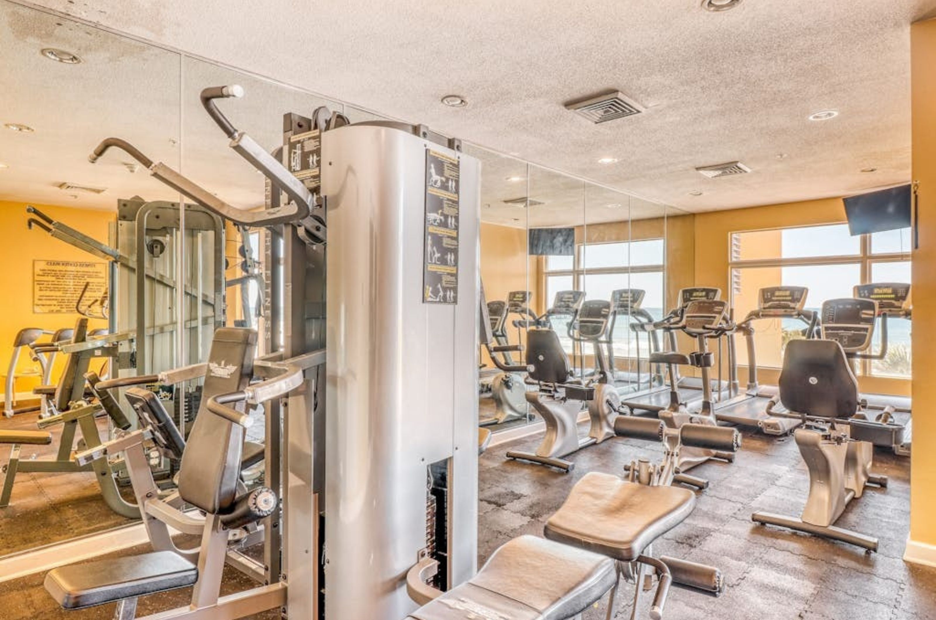 Strength and cardio equipment in the gym at Sterling Reef in Panama City Beach Florida 