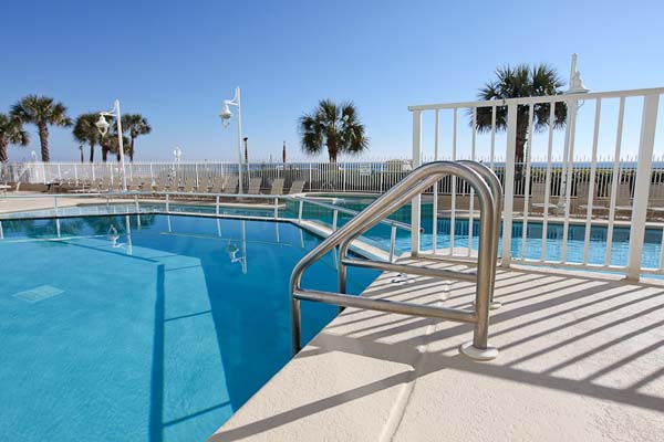 Outdoor pool with waterfalls and hot tubs at Sterling Resorts at Miramar Beach in Destin Florida