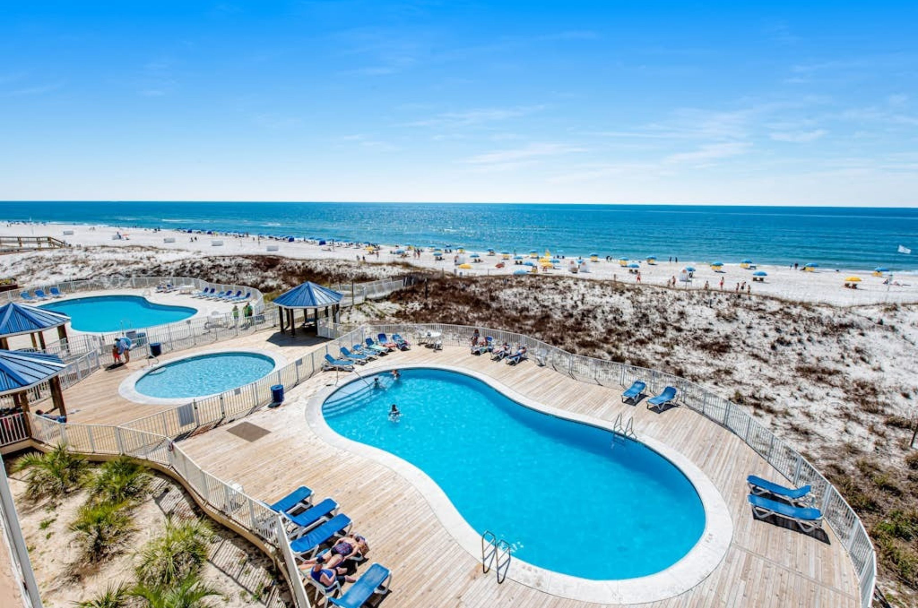 View from a balcony of the outdoor pools at Sugar Beach in Orange Beach Alabama