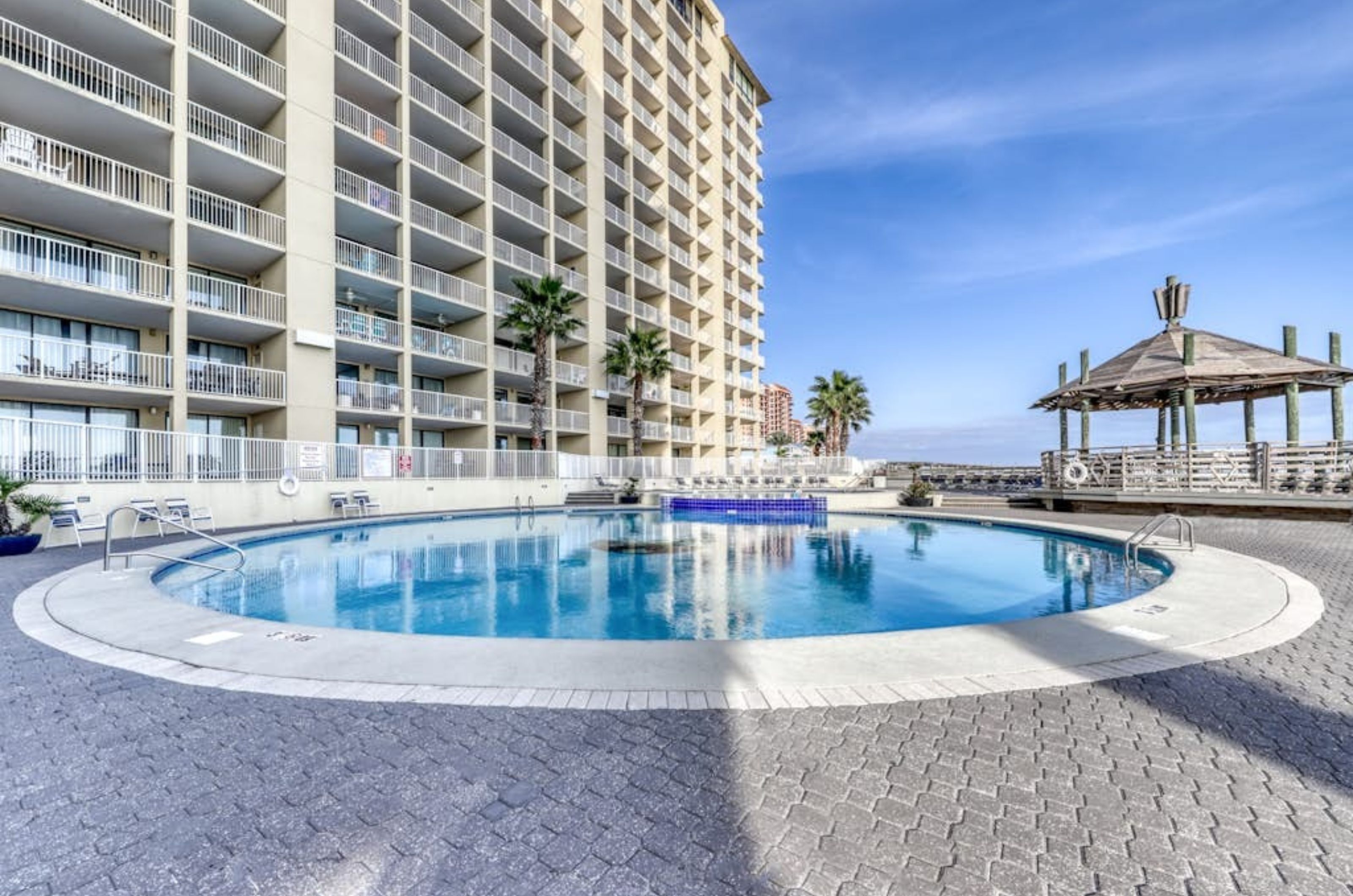 The outdoor swimming pool in front of Summer House on Romar Beach