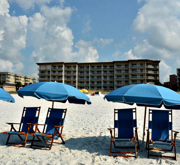 Beach chairs and umbrellas at Summer Place in Fort Walton Beach FL