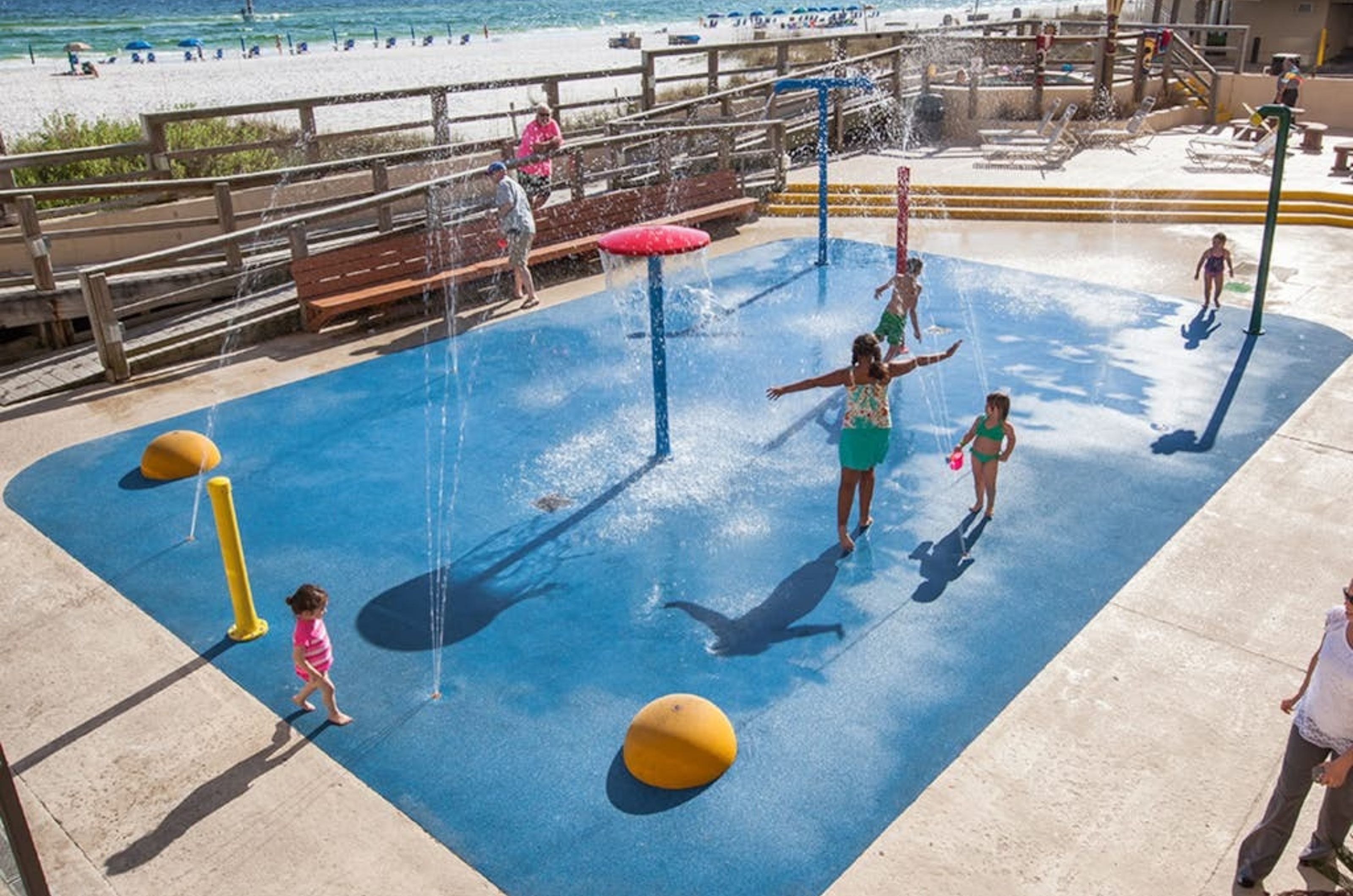 Aerial view of kids playing on the splash pad at SunDestin Resort in Destin Florida 