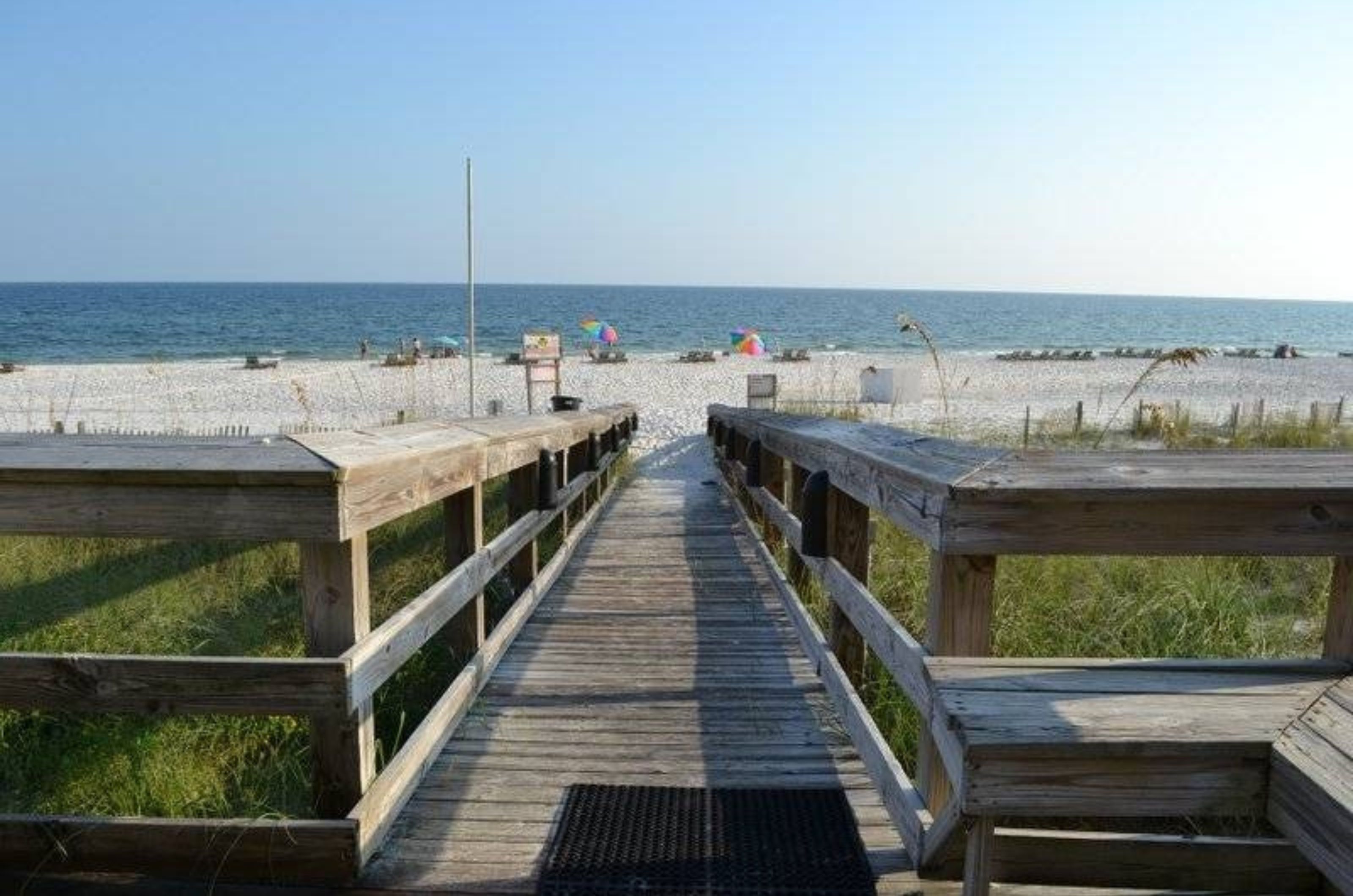 A wooden boardwalk leading to the Gulf at Sunswept Condos in Orange Beach Alabama