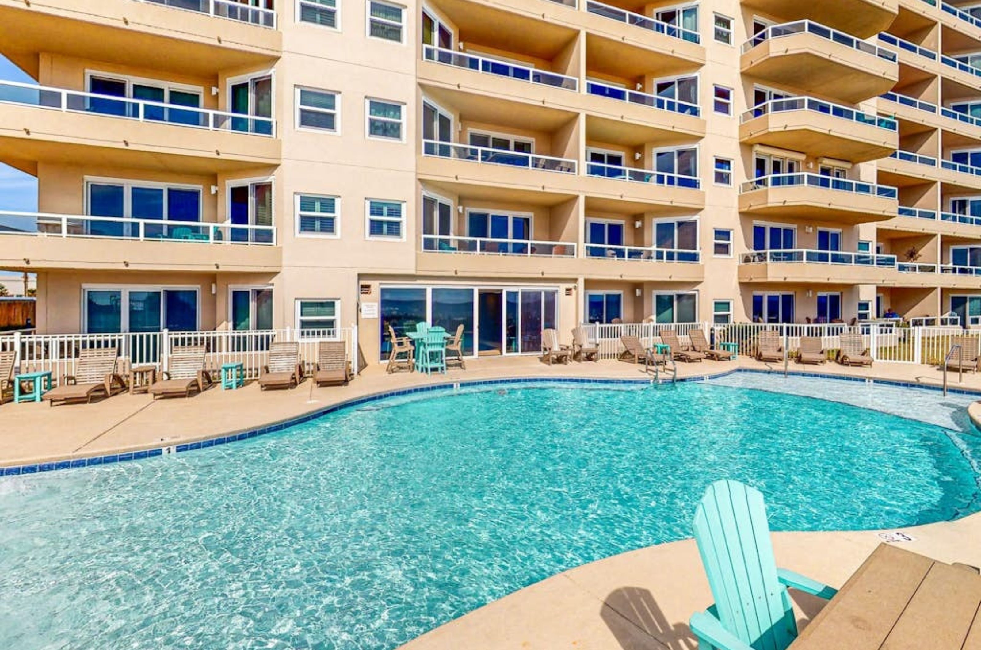 The zero-entry outdoor swimming pool in front of the Enclave in Orange Beach Alabama 