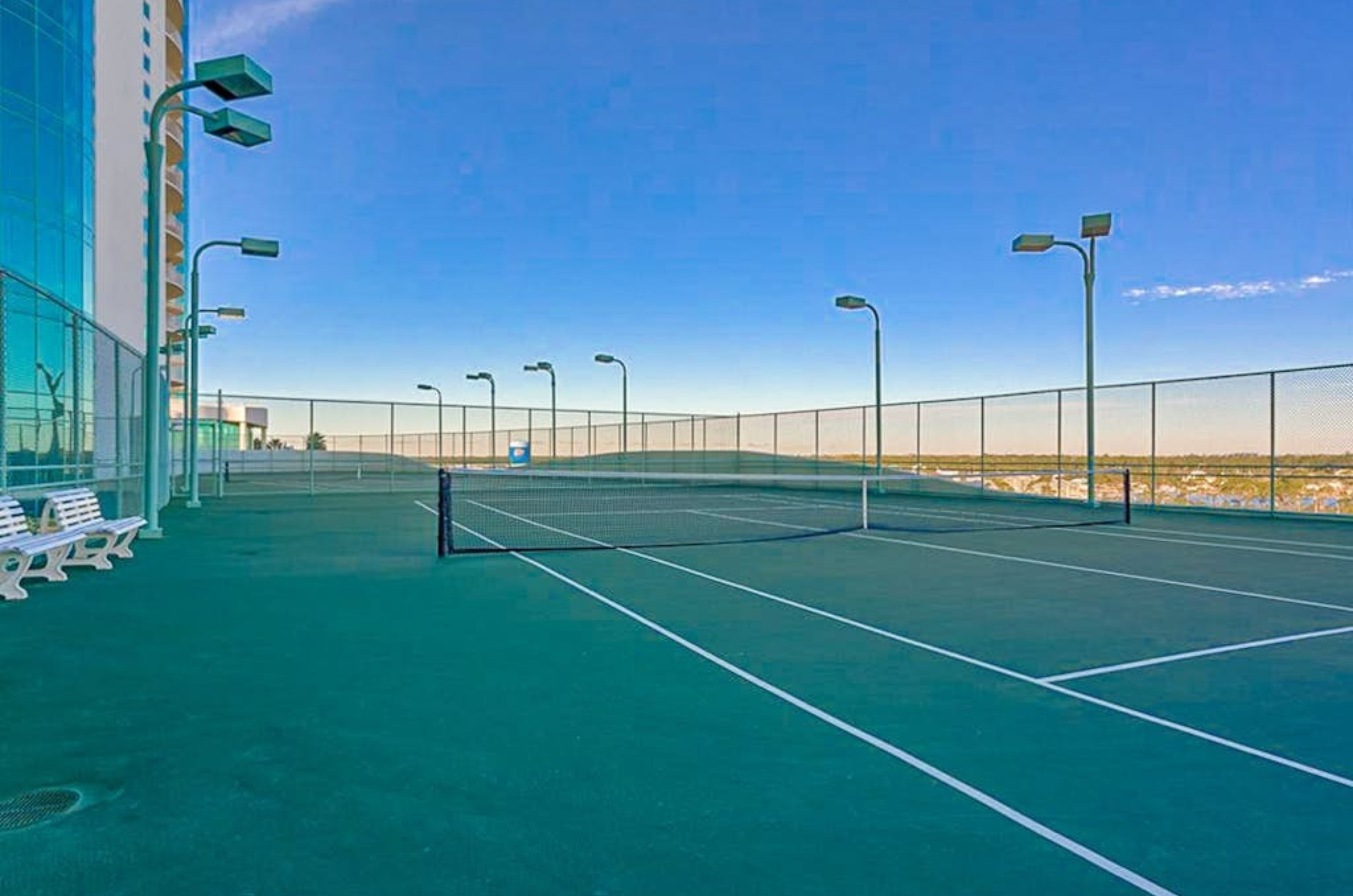 The beachside tennis court overlooking the Gulf at Turquoise Place