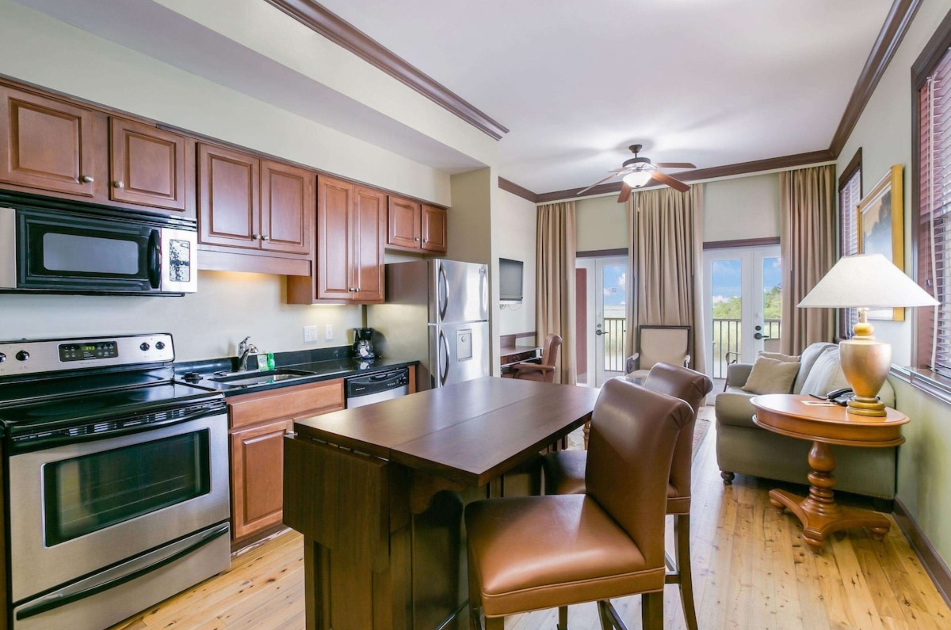 The fully furnished kitchen in a suite at Water Street Hotel & Marina	